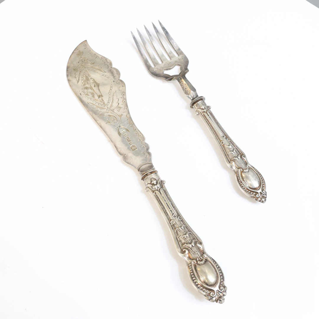 FISKSERVERINGSBESTICK, 2 delar, nysilver, 1900-talets början.