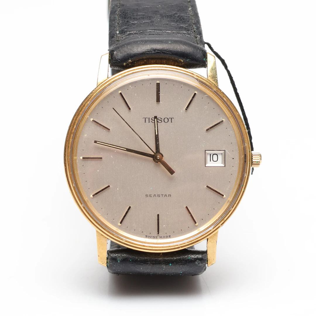 HERRARMBANDSUR, guld, Tissot Seastar.