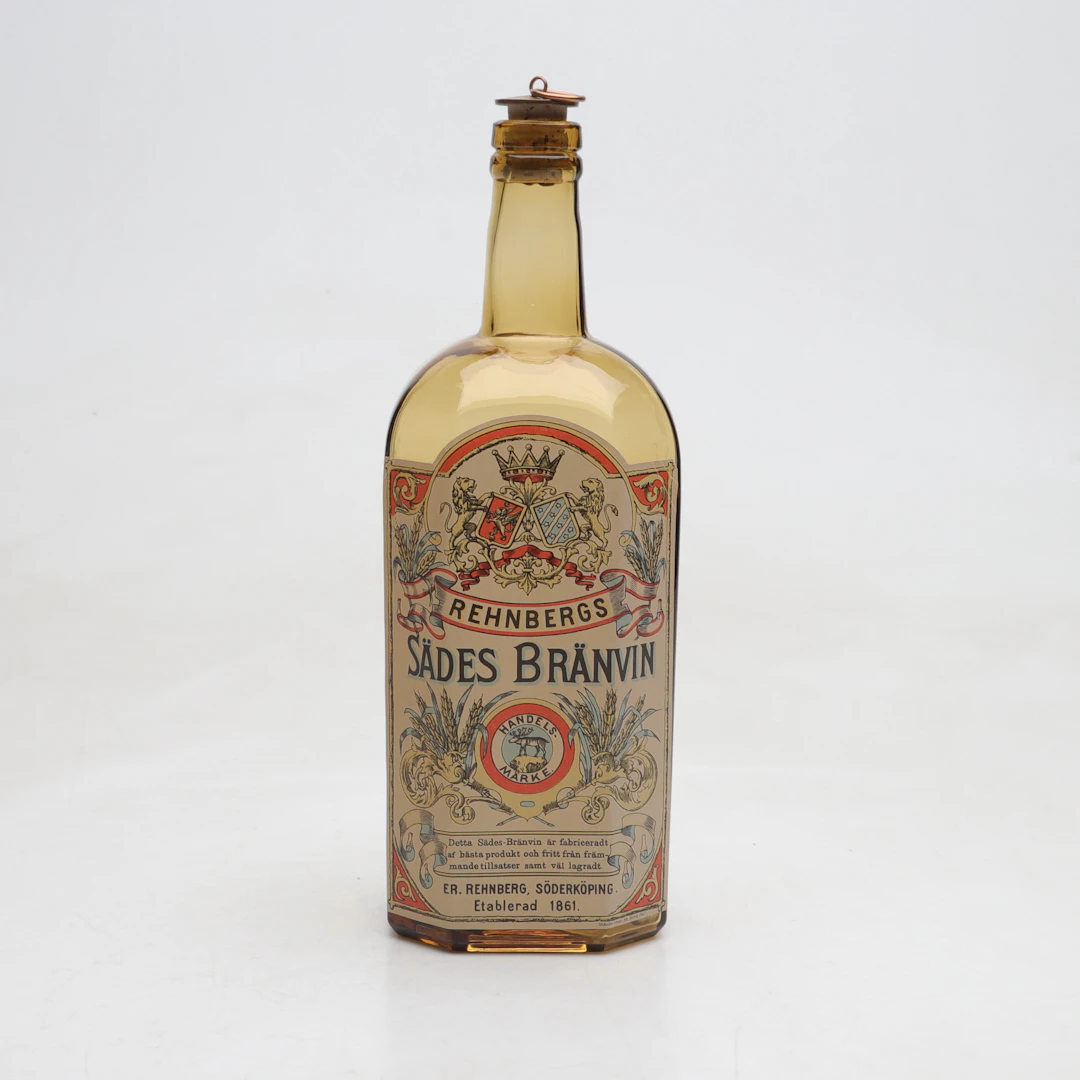 FLASKA, glas, "Rehnbergs Sädesbrännvin, Söderköping", Reijmyre, 1900-talets