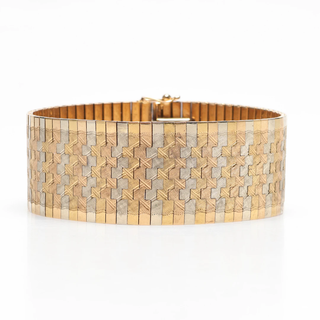 ARMBAND, ledad länk, 18K flerfärgat guld, vikt ca 74gram.