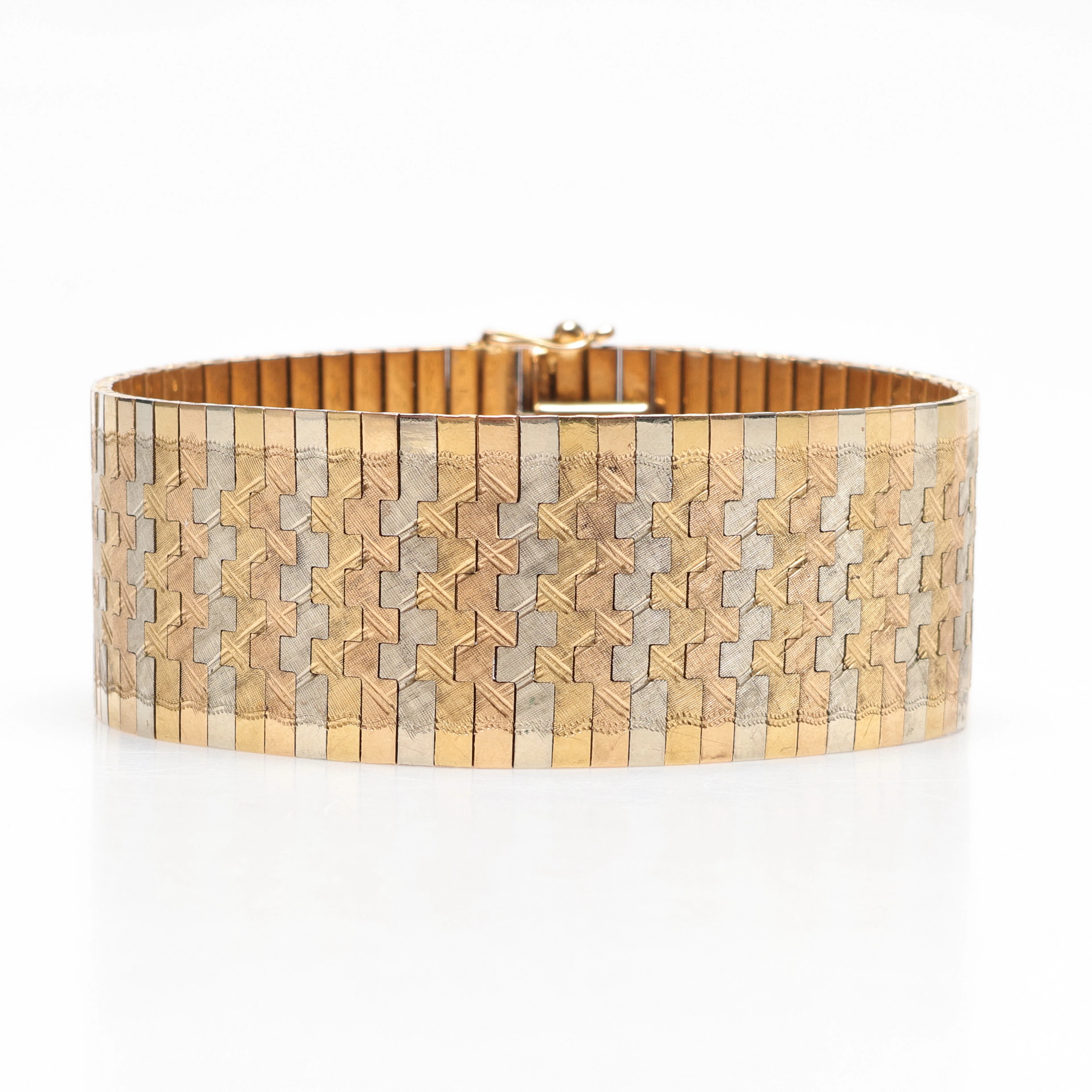 ARMBAND, ledad länk, 18K flerfärgat guld, vikt ca 74gram.
