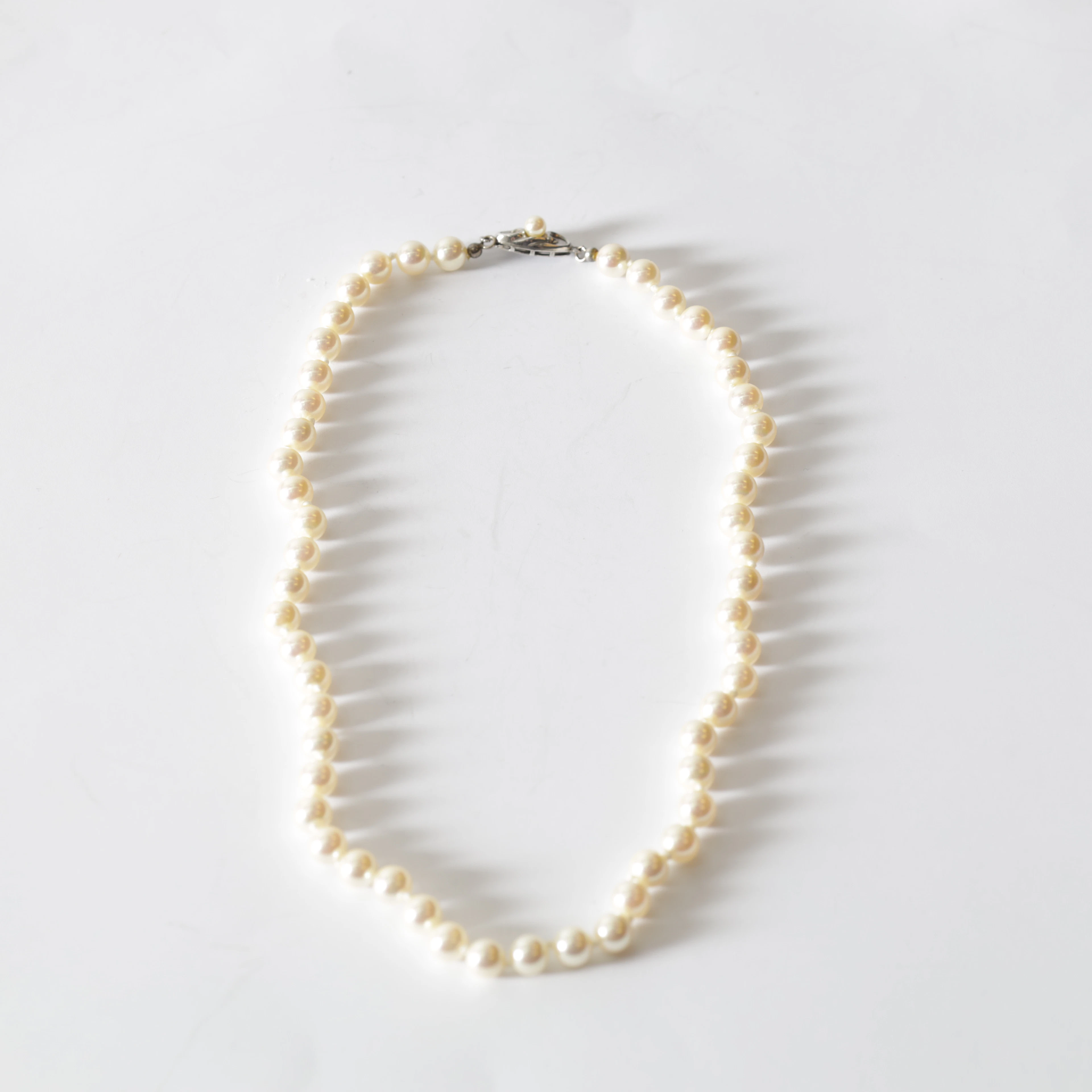 PÄRLCOLLIER, lås i sterlingsilver, 1900-tal.