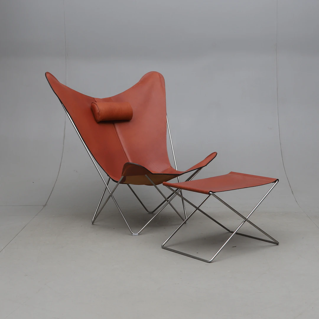 DENNIS MARQUART. Fåtölj & fotpall, "KS Chair", läder och stål, OX