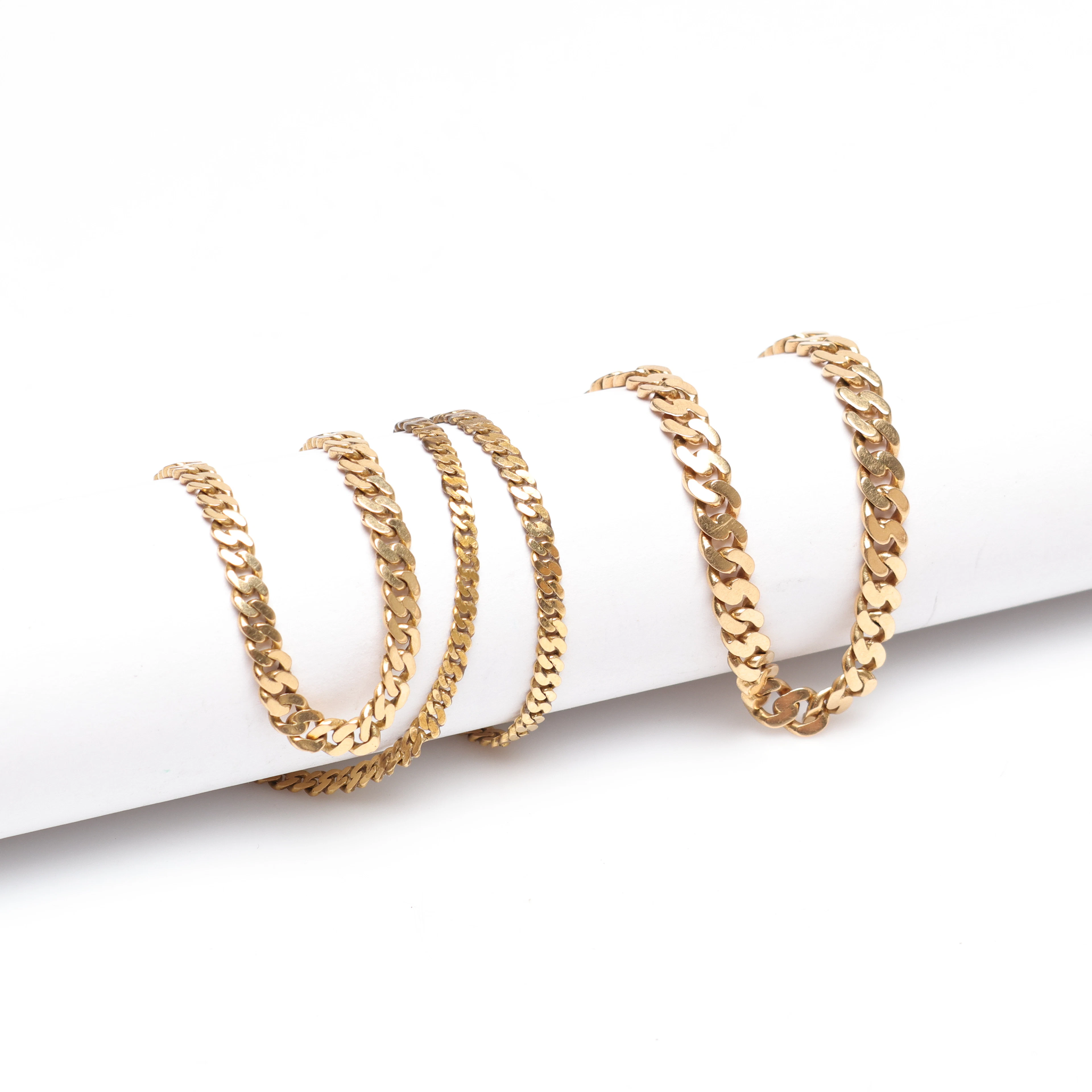 HALSKEDJA samt ARMBAND, guld, "manglad pansar", 18k, ca 18 gram.