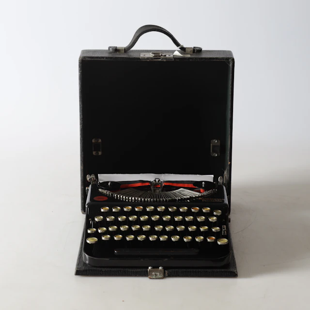 RESESKRIVMASKIN, Remington Portable, 1900-talets början.