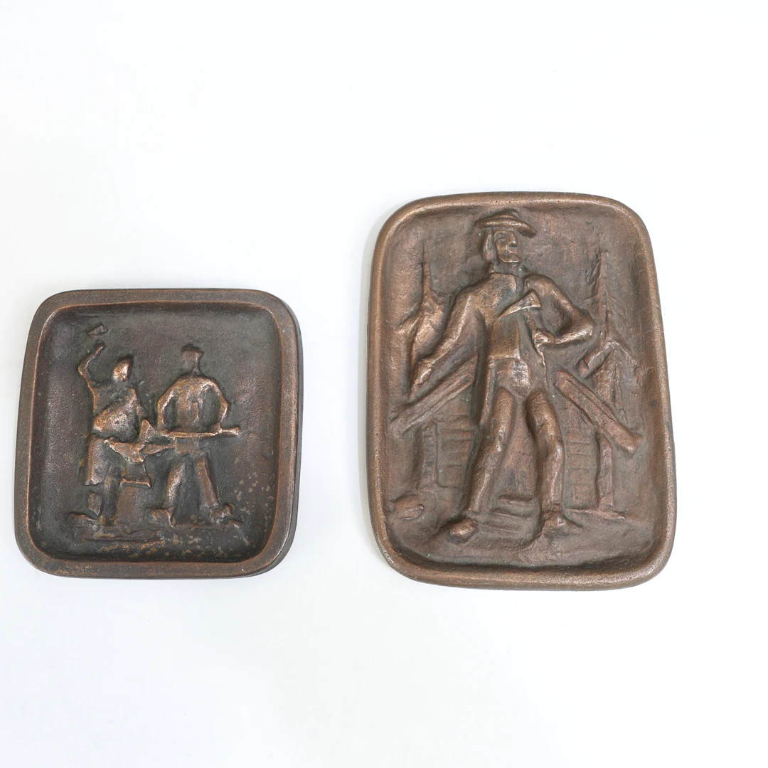 ALLAN EBELING. Väggplaketter, 2 st. Brons, "Smederna" samt "Skogskarl"