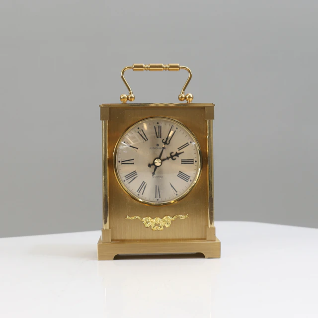 BORDSUR, mässing, Junghans quartz, Tyskland, 1900-tal.