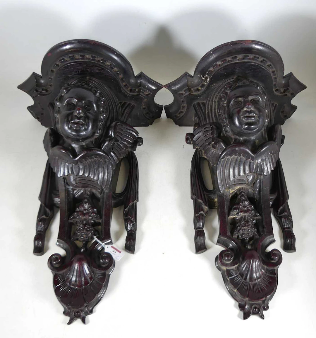 Lot 38 - A pair of early 20th century carved hardwood