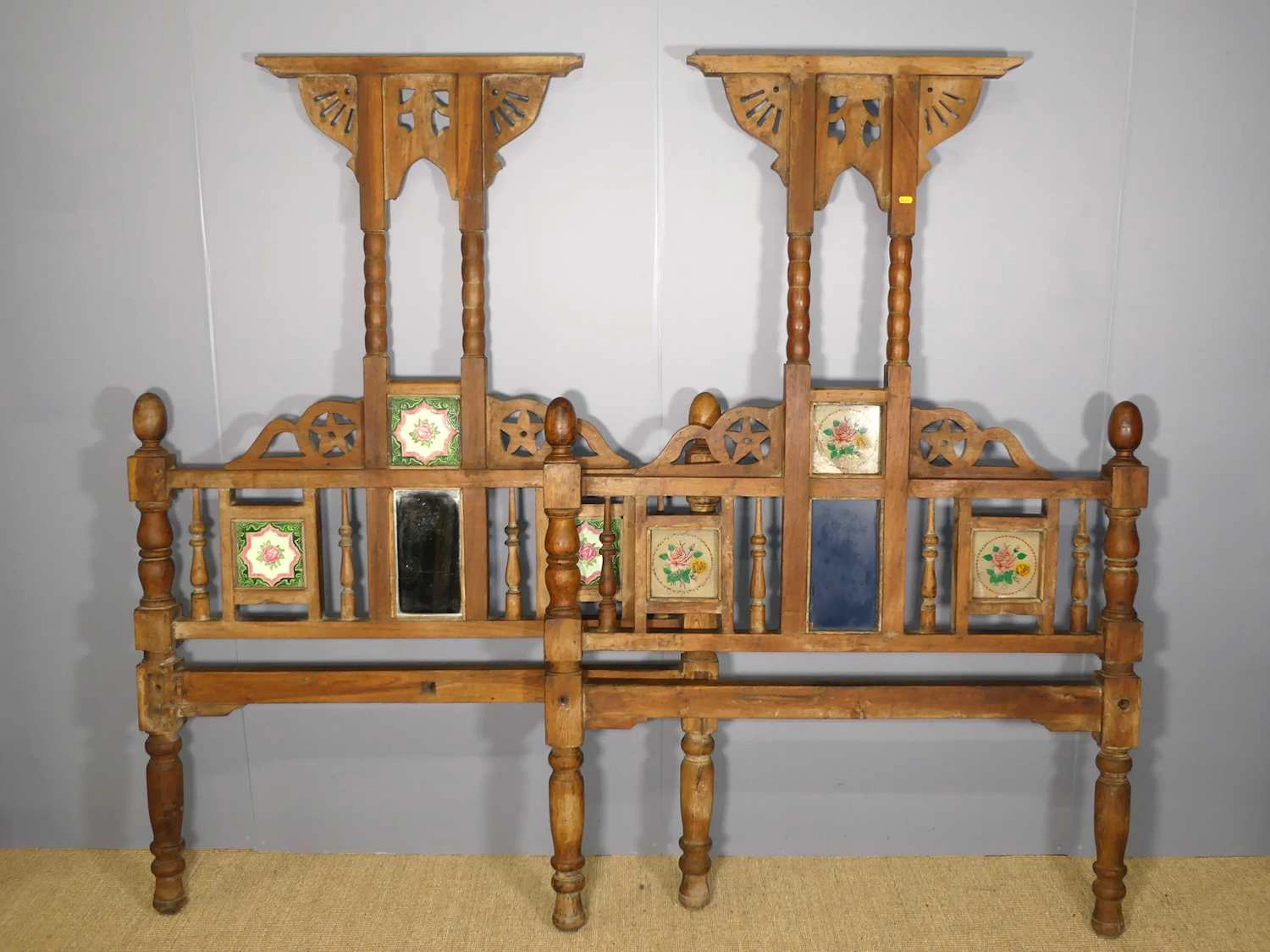 Lot 765 - An Eastern teak three-quarter-size bedstead