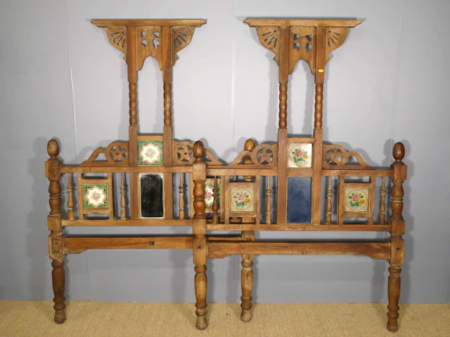 Lot 765 - An Eastern teak three-quarter-size bedstead