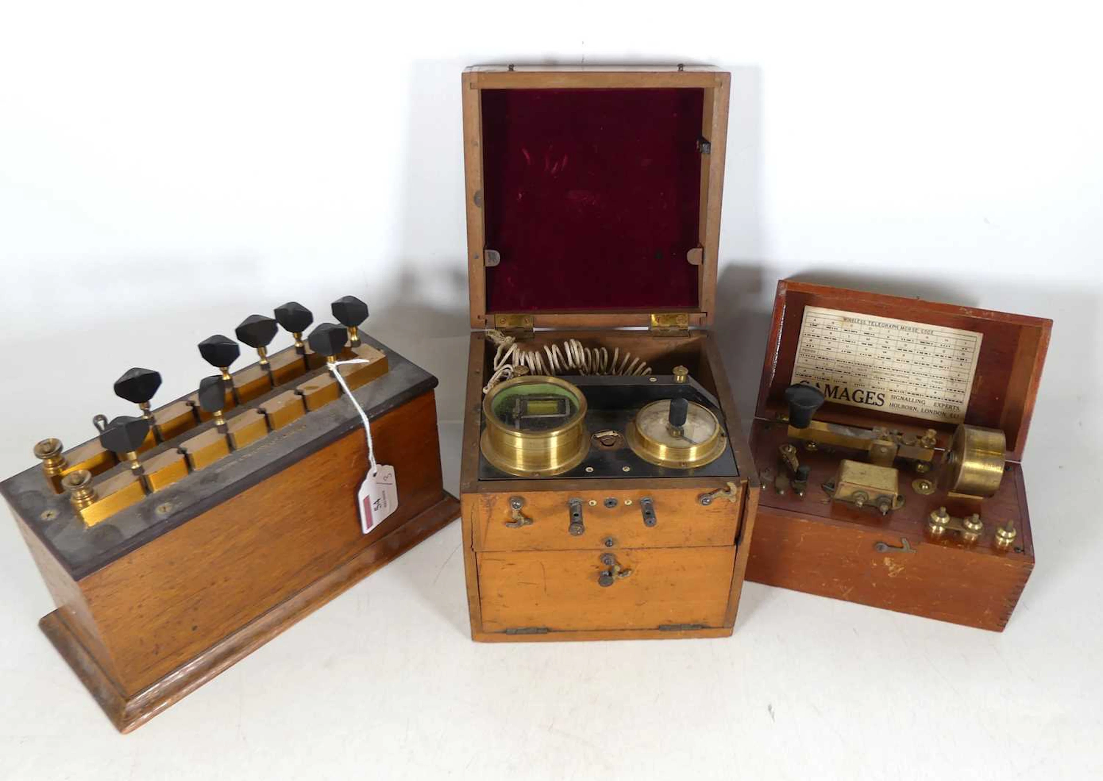Lot 54 - A Gamages Morse code signaller, in a fitted