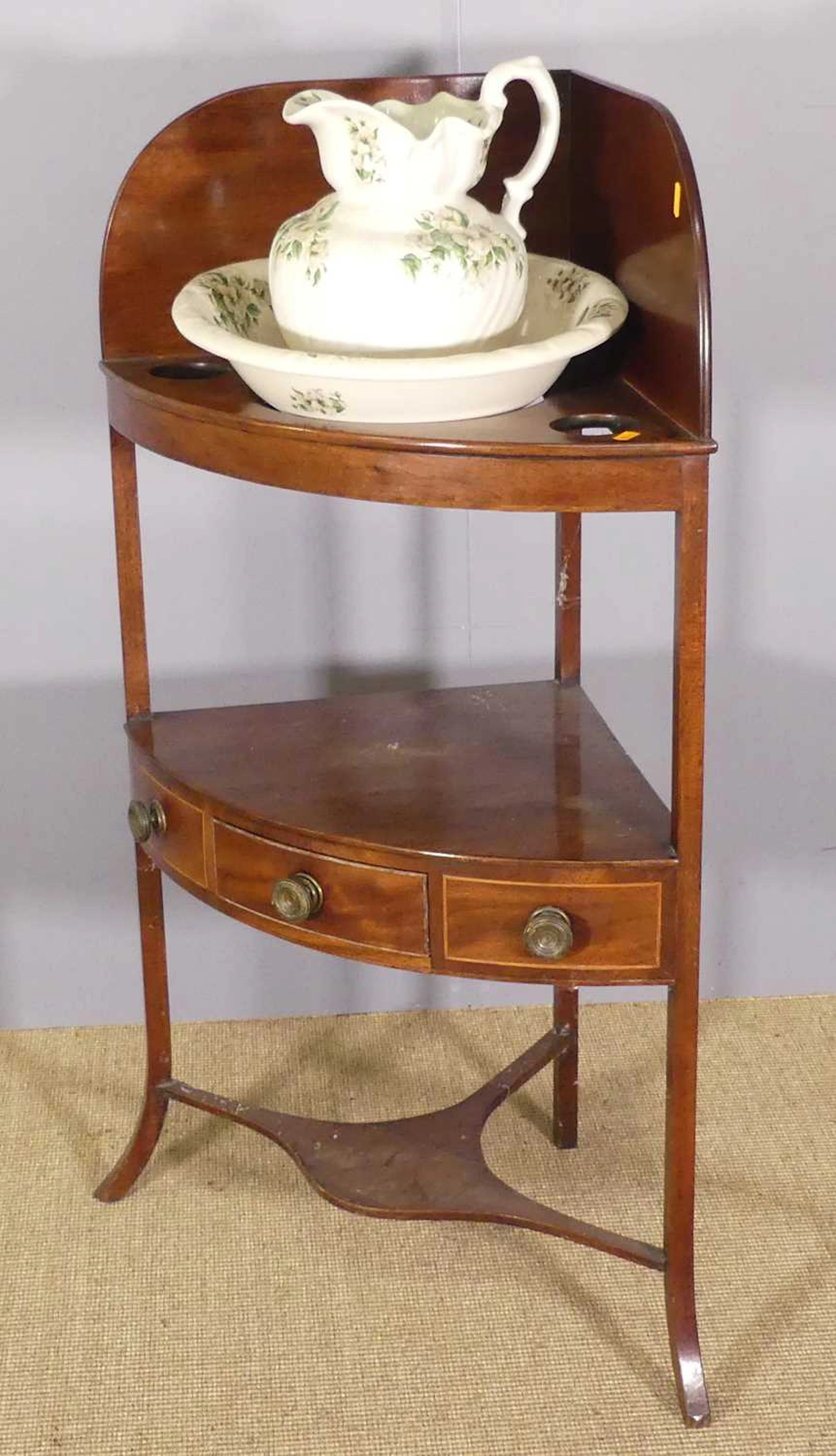 Lot 640 - An early 19th century mahogany bowfront