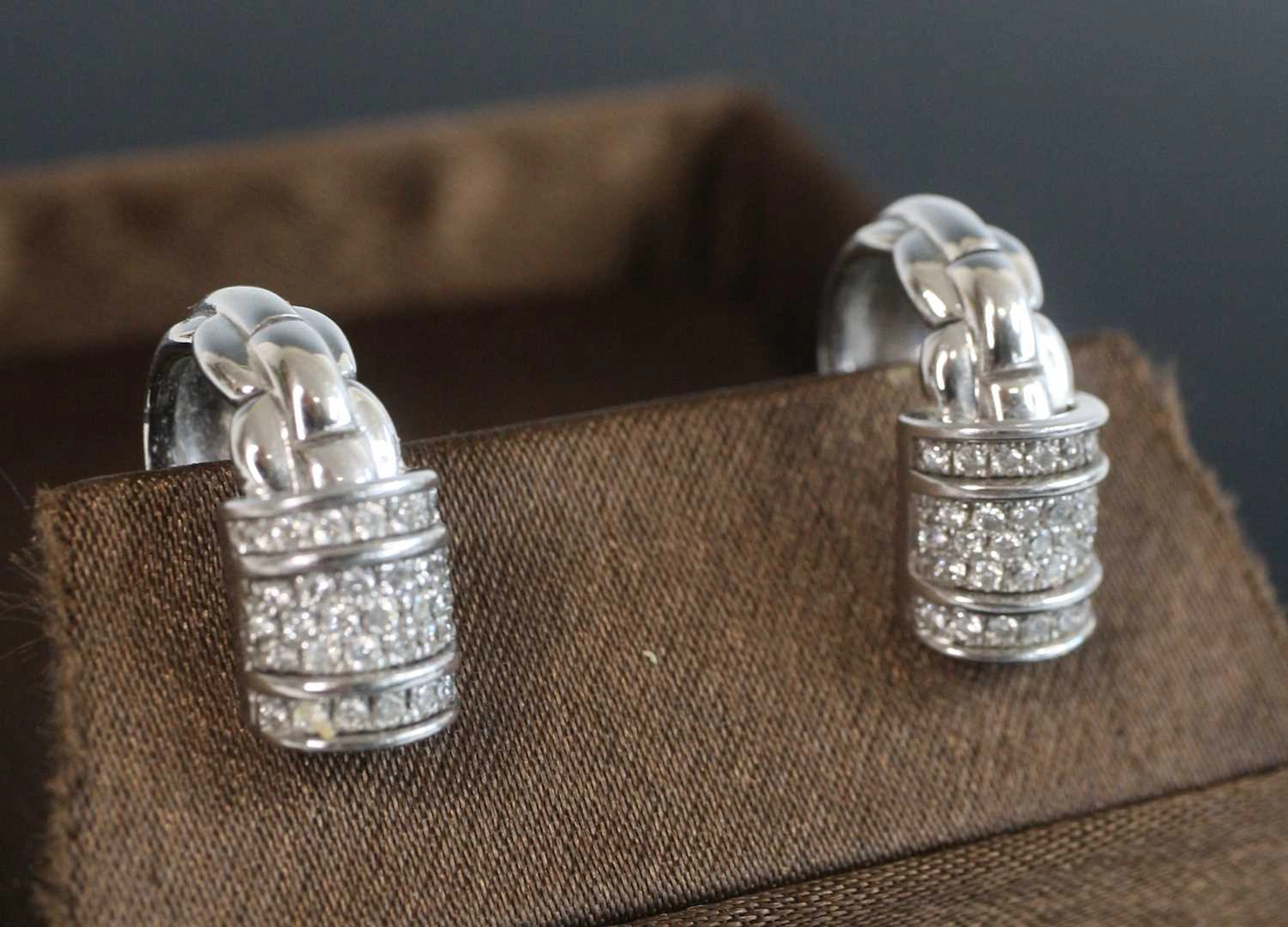Lot 2229 - A pair of 18ct white gold Fope Flex-It