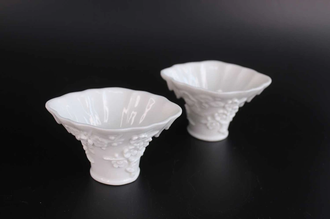 Lot 48 - A Pair of Chinese Blanc de Chine Rhinoceros