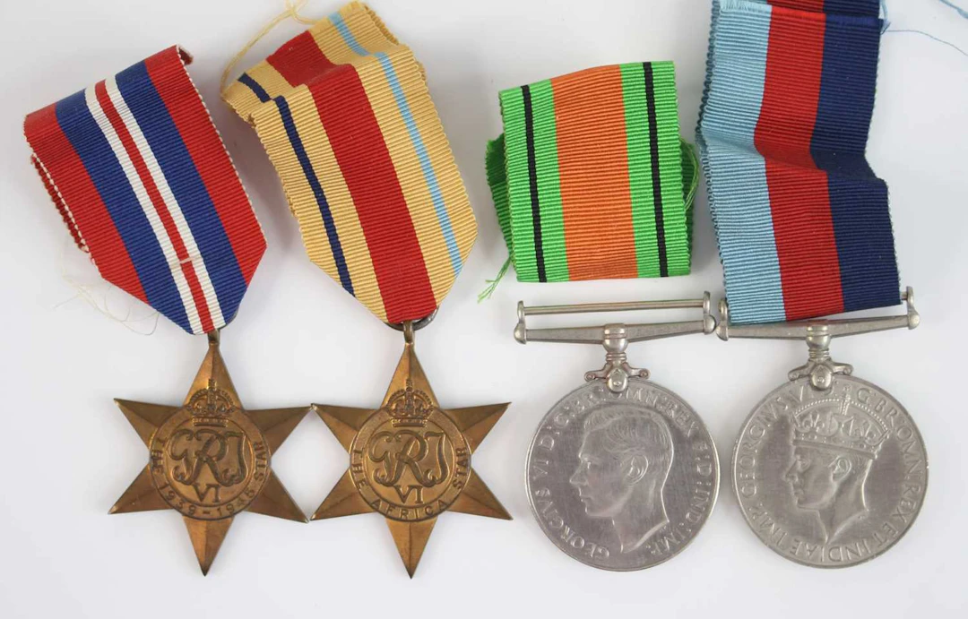 Lot 1019 - A group of four WW II medals to include