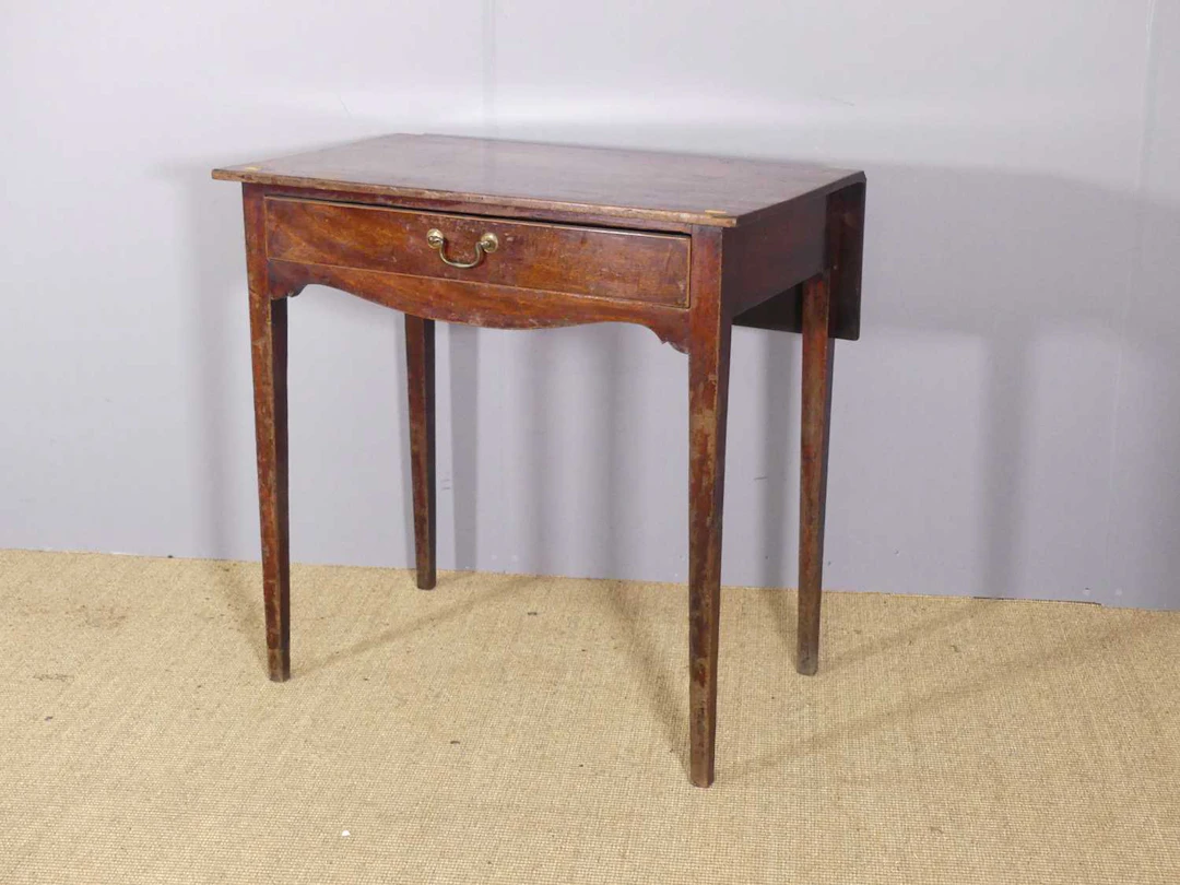 Lot 727 - An early 19th century mahogany single drawer