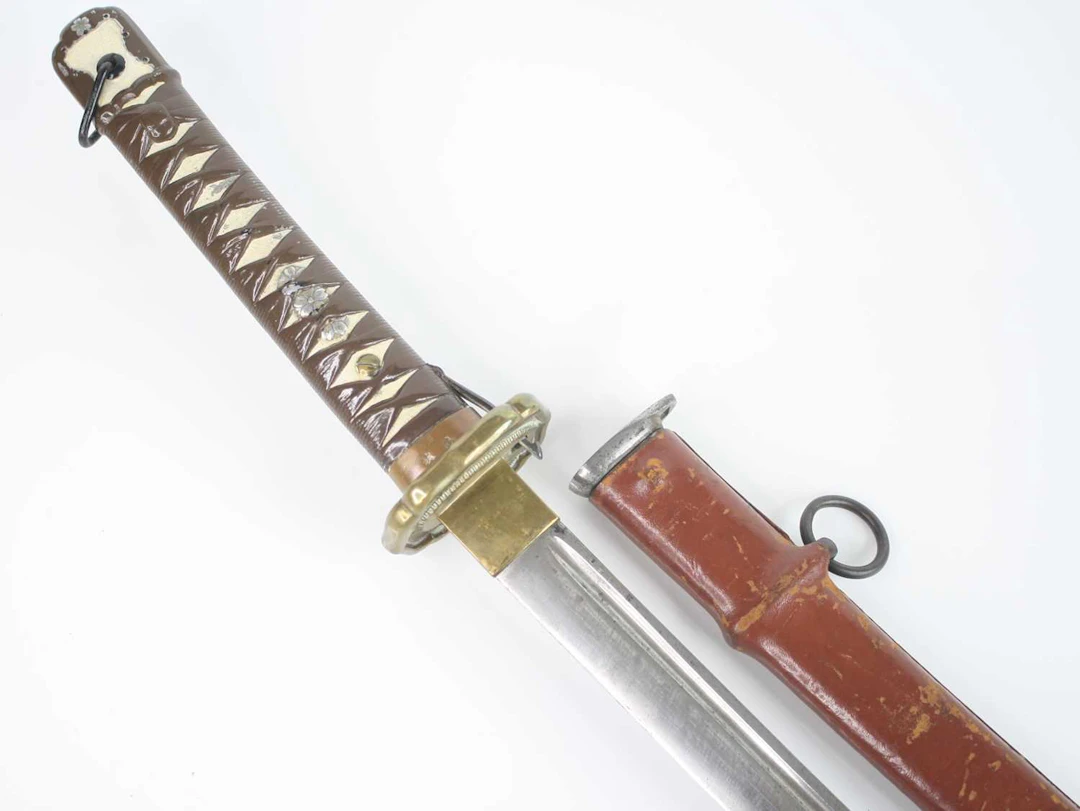 Lot 1106 - A WW II Japanese NCO shin gunto, having a