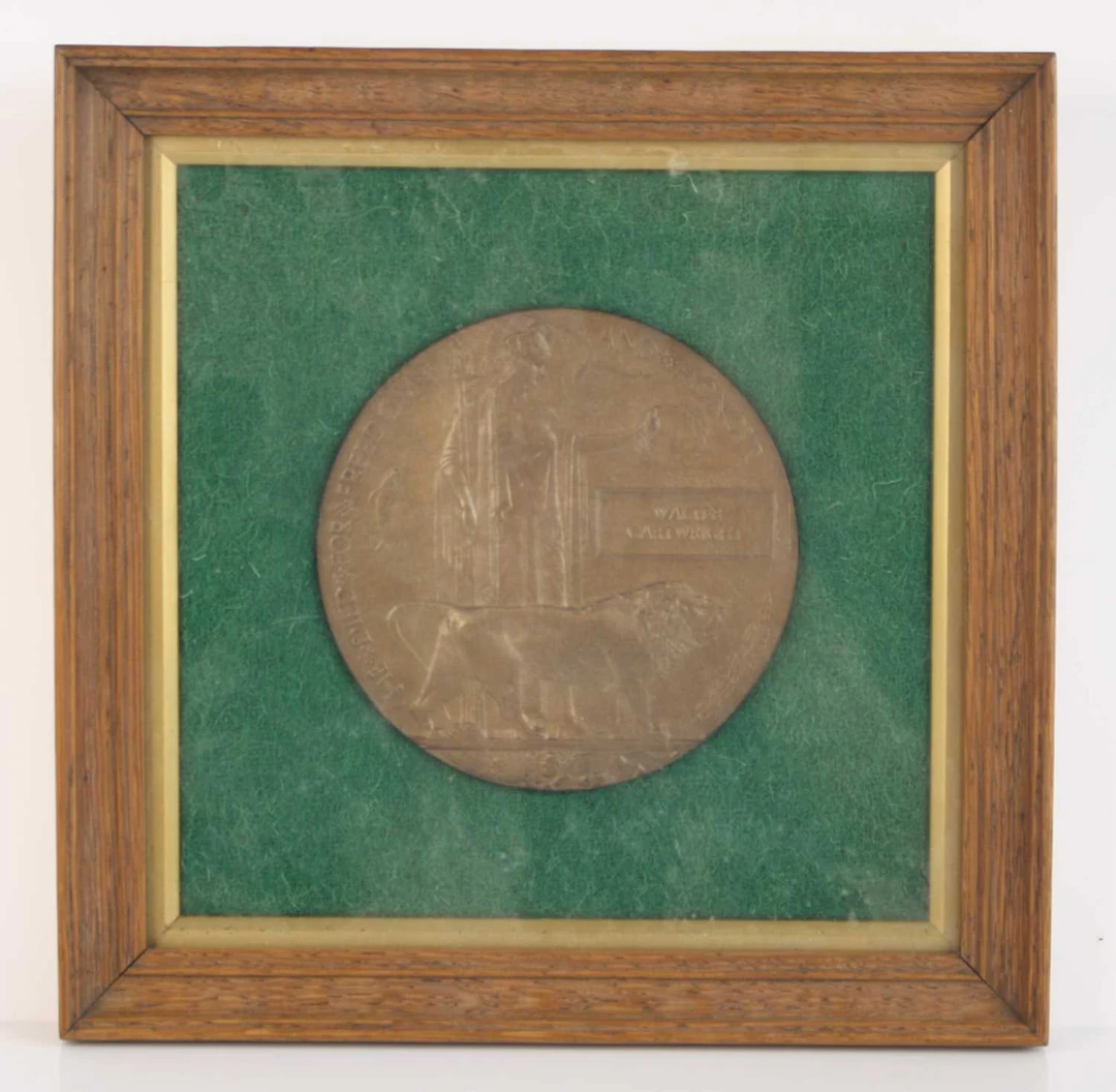 Lot 1088 - A WW I bronze memorial plaque, naming