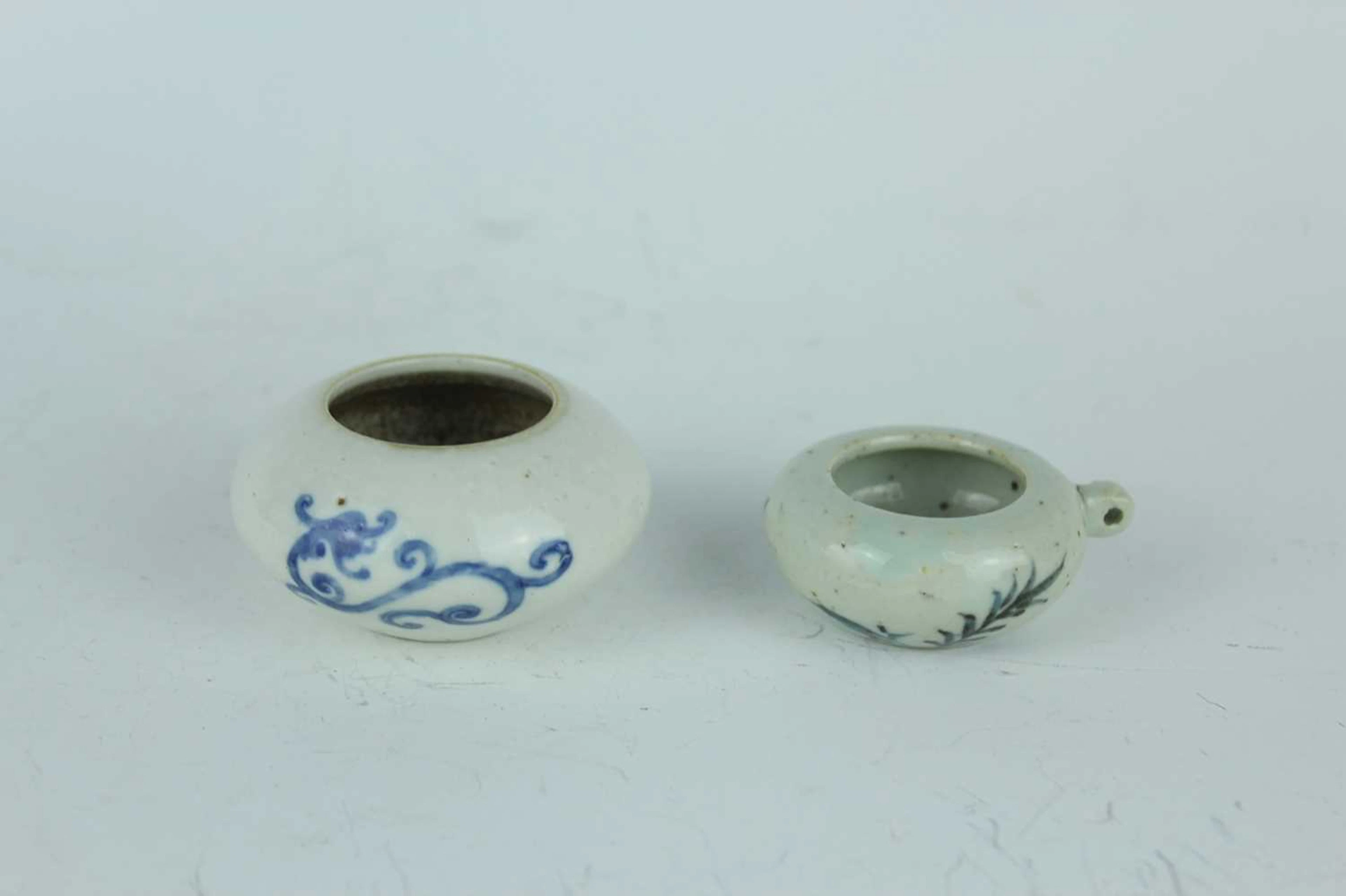 Lot 102 - A Chinese blue and white water pot and a