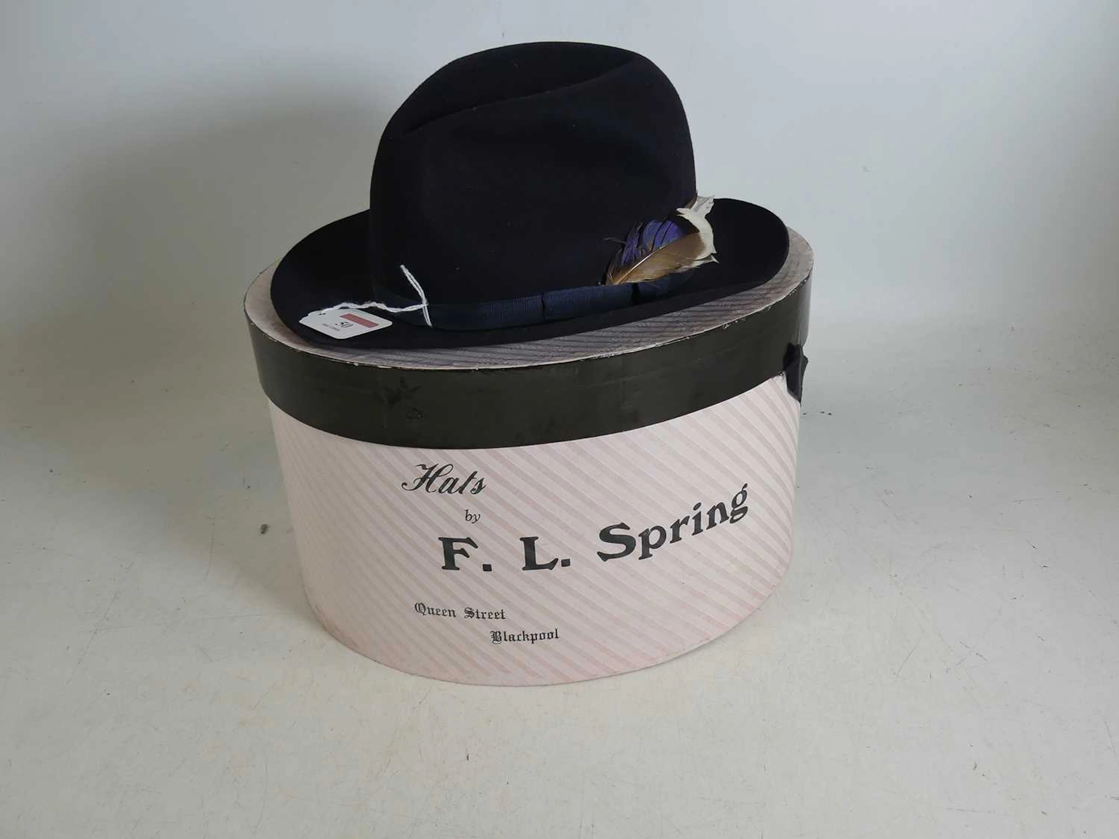 Lot 50 - A lady's navy felt fedora, by Lock & Co