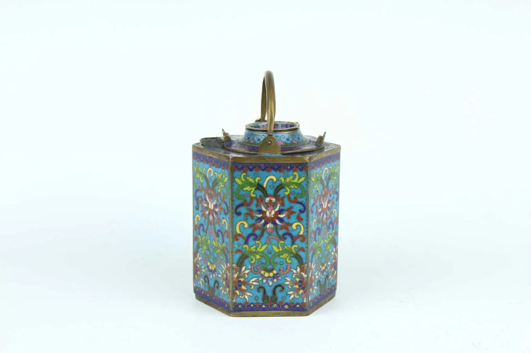 Lot 25 - A Chinese hexagonal cloisonné enamel nested