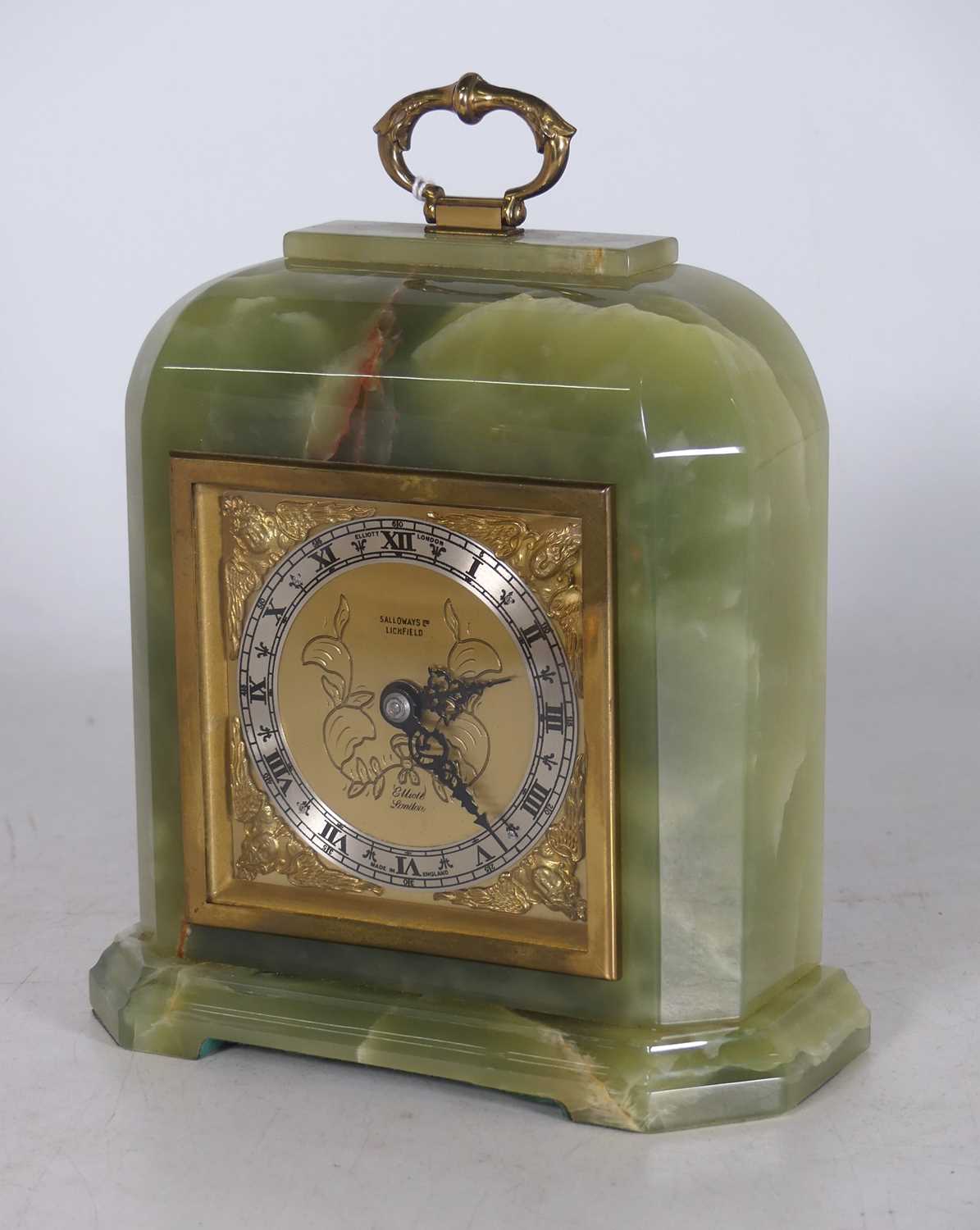 Lot 15 - Elliot of London, onyx and brass mantel clock