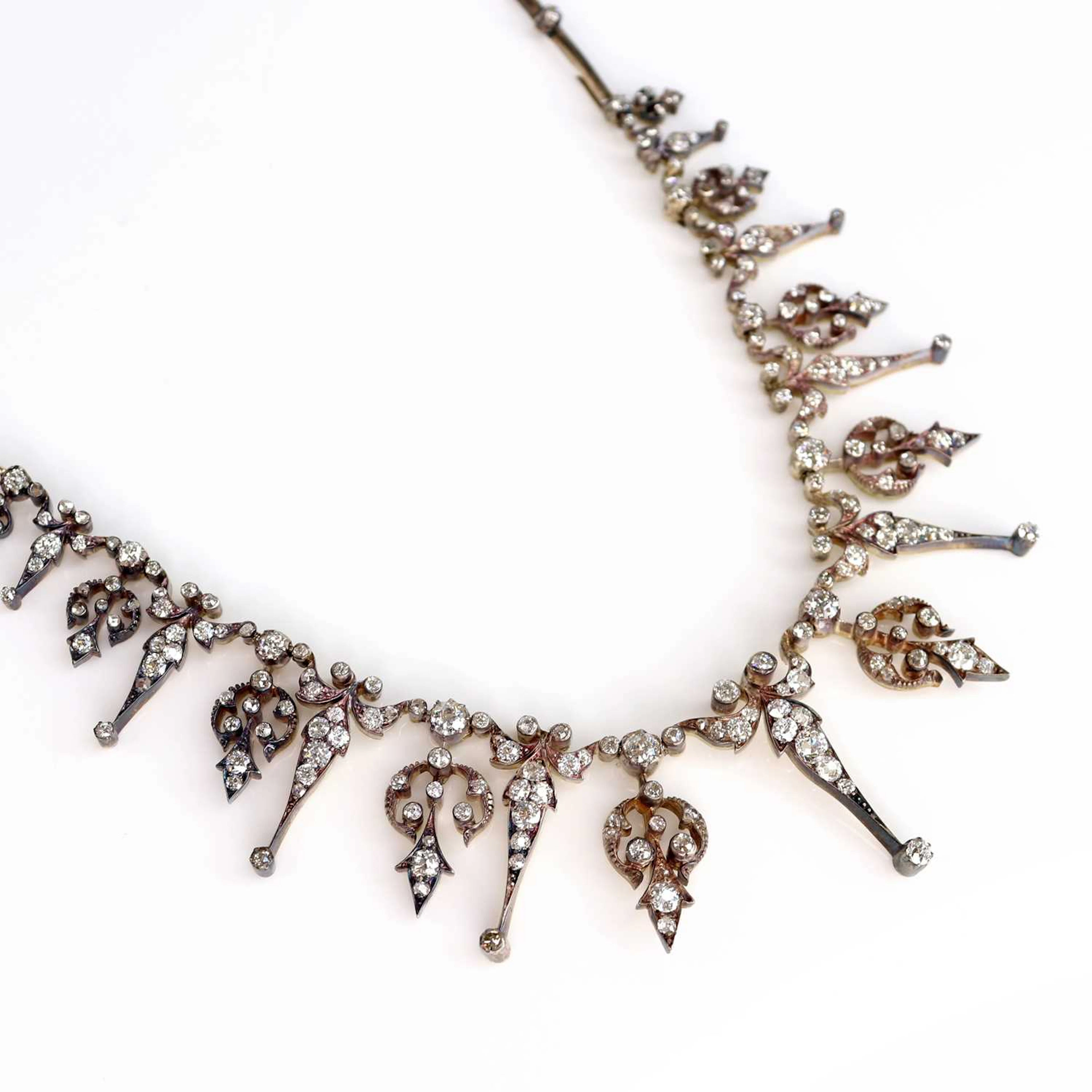 A late Victorian yellow and white metal diamond fringe