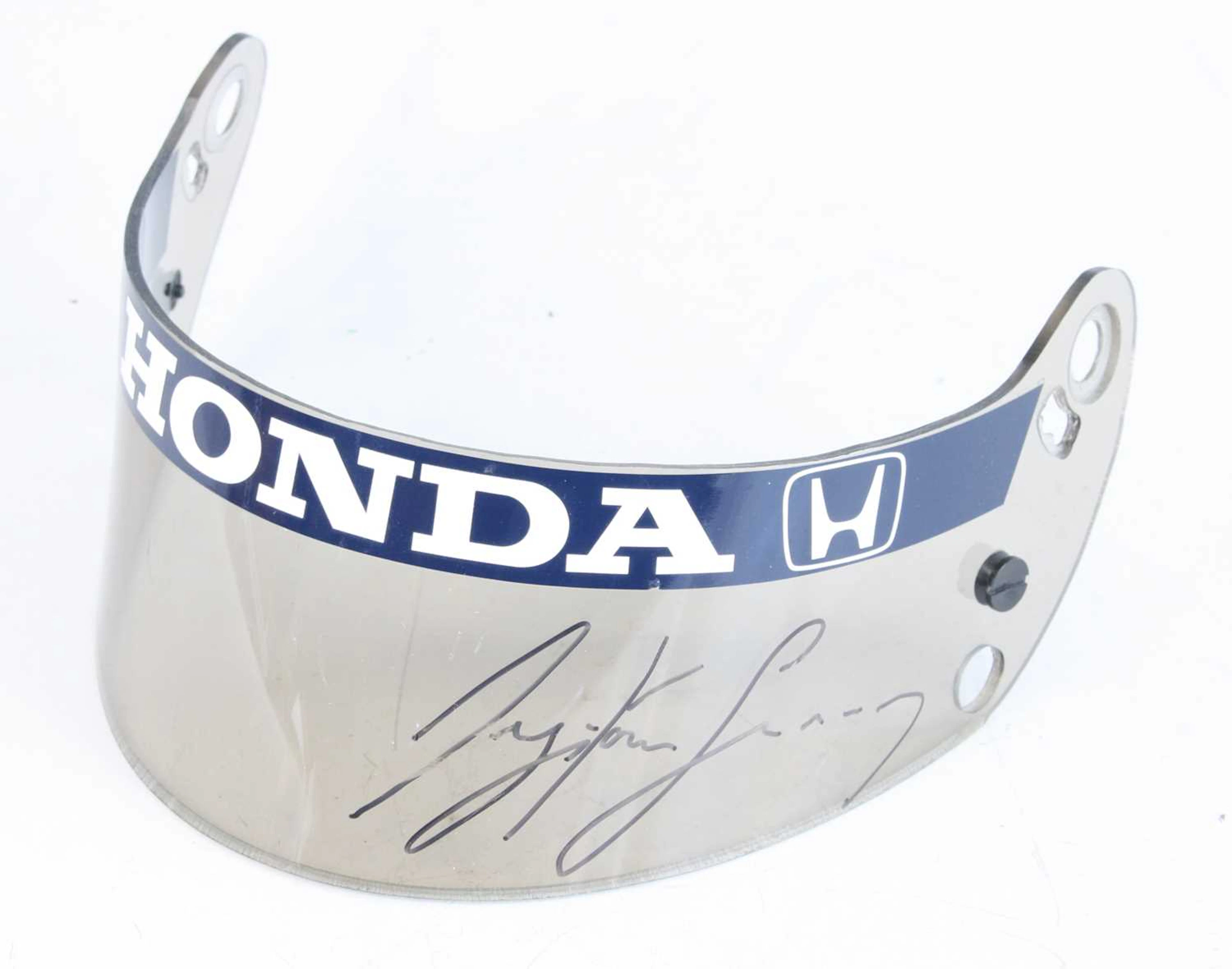 Lot 420 - A McLaren motor racing helmet visor, signed
