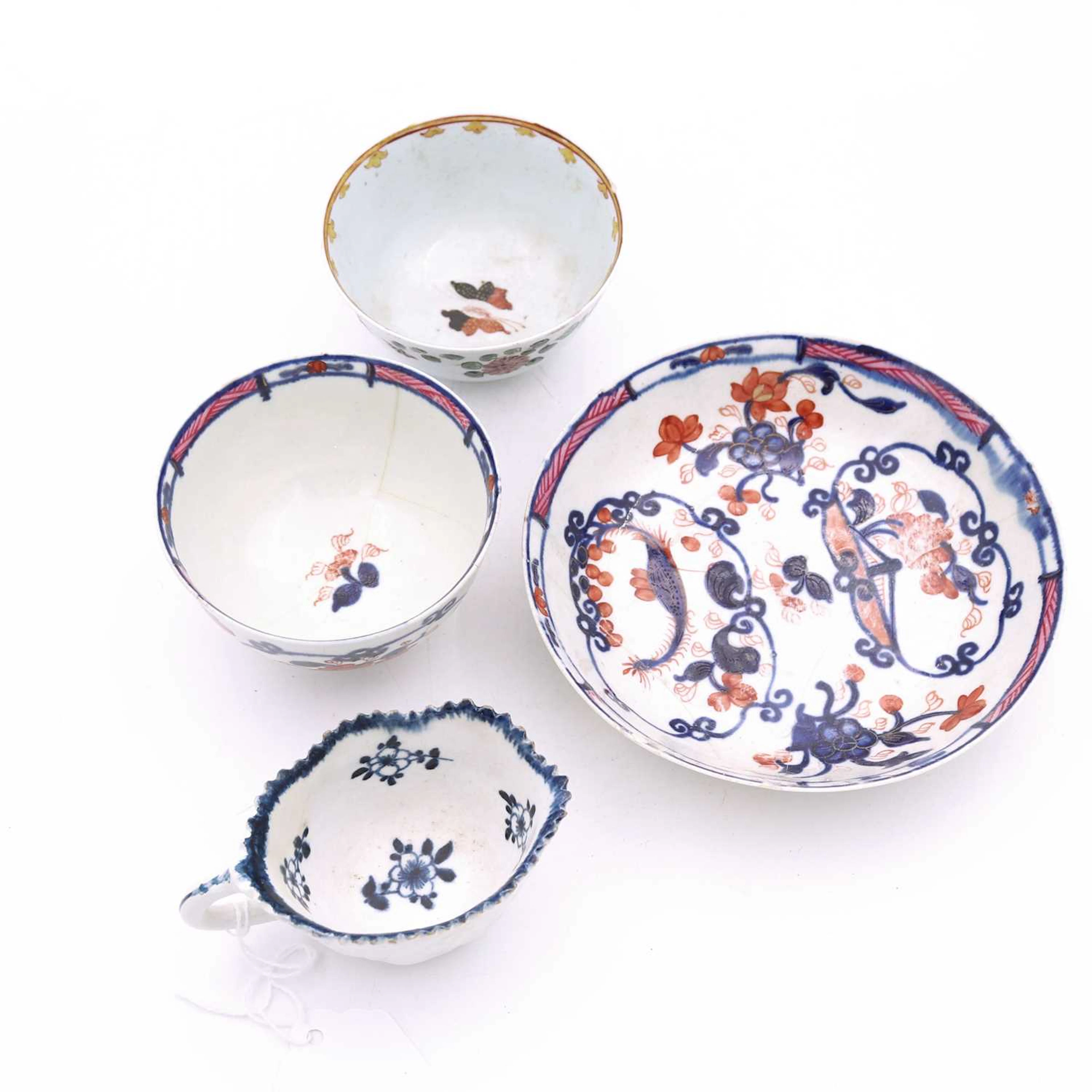 Lot 105 - A Liverpool porcelain moulded butter boat