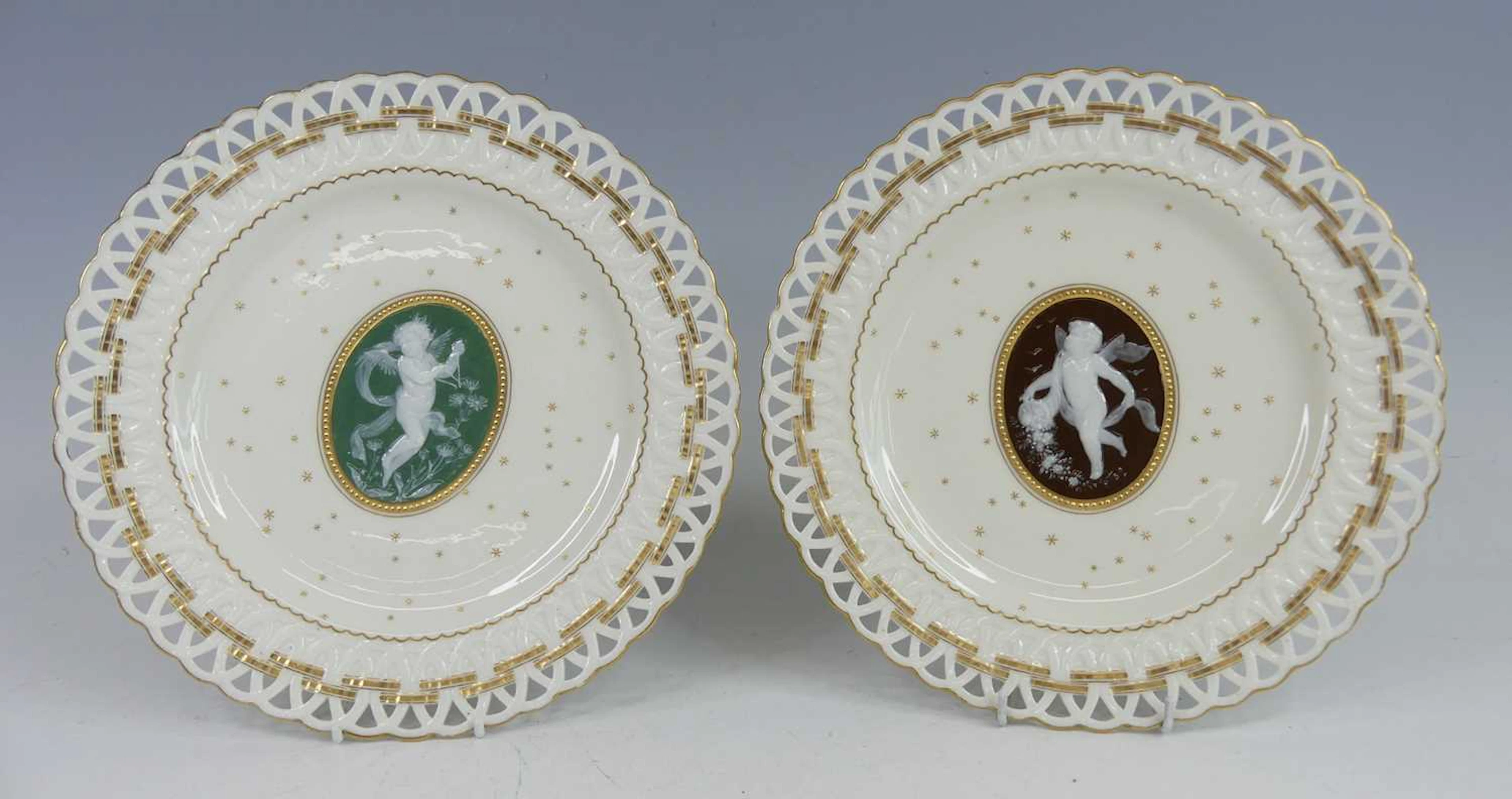 Lot 2040 - A pair of Mintons pate-sur-pate cabinet