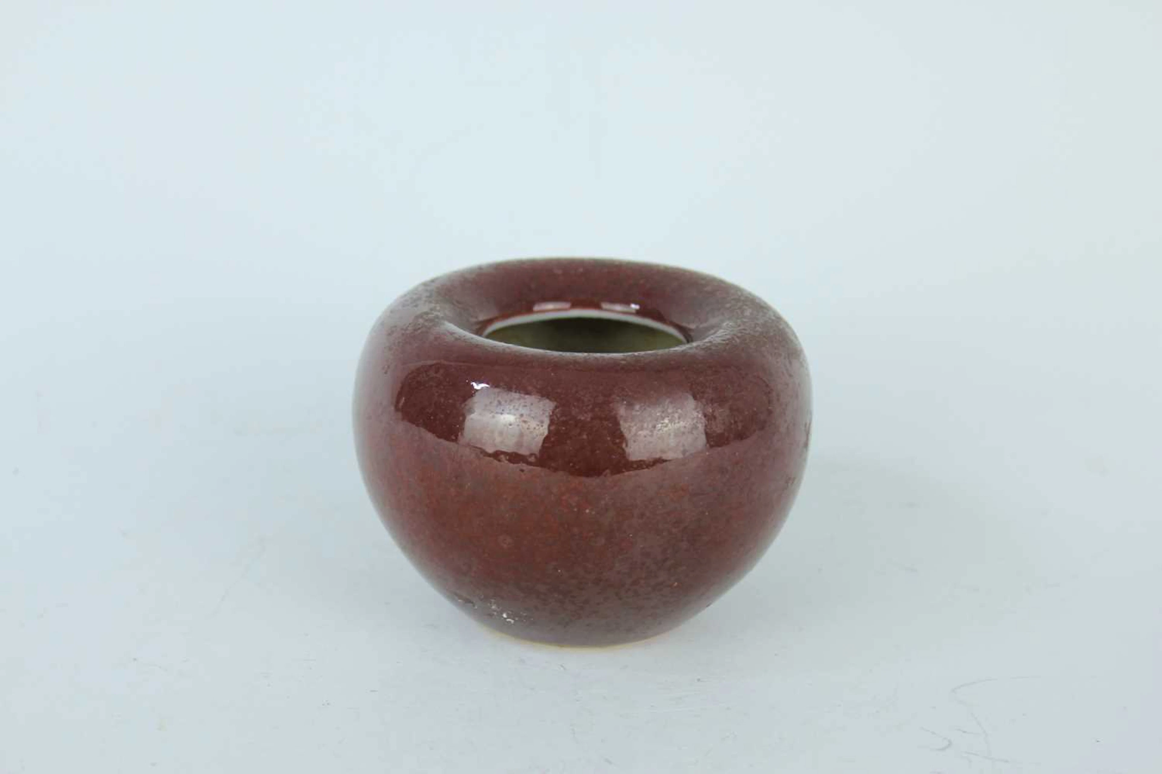 Lot 71 - A Chinese sang-de-boeuf glazed porcelain