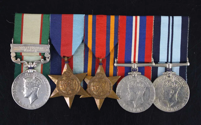 Lot 1223 - A group of five medals to include India