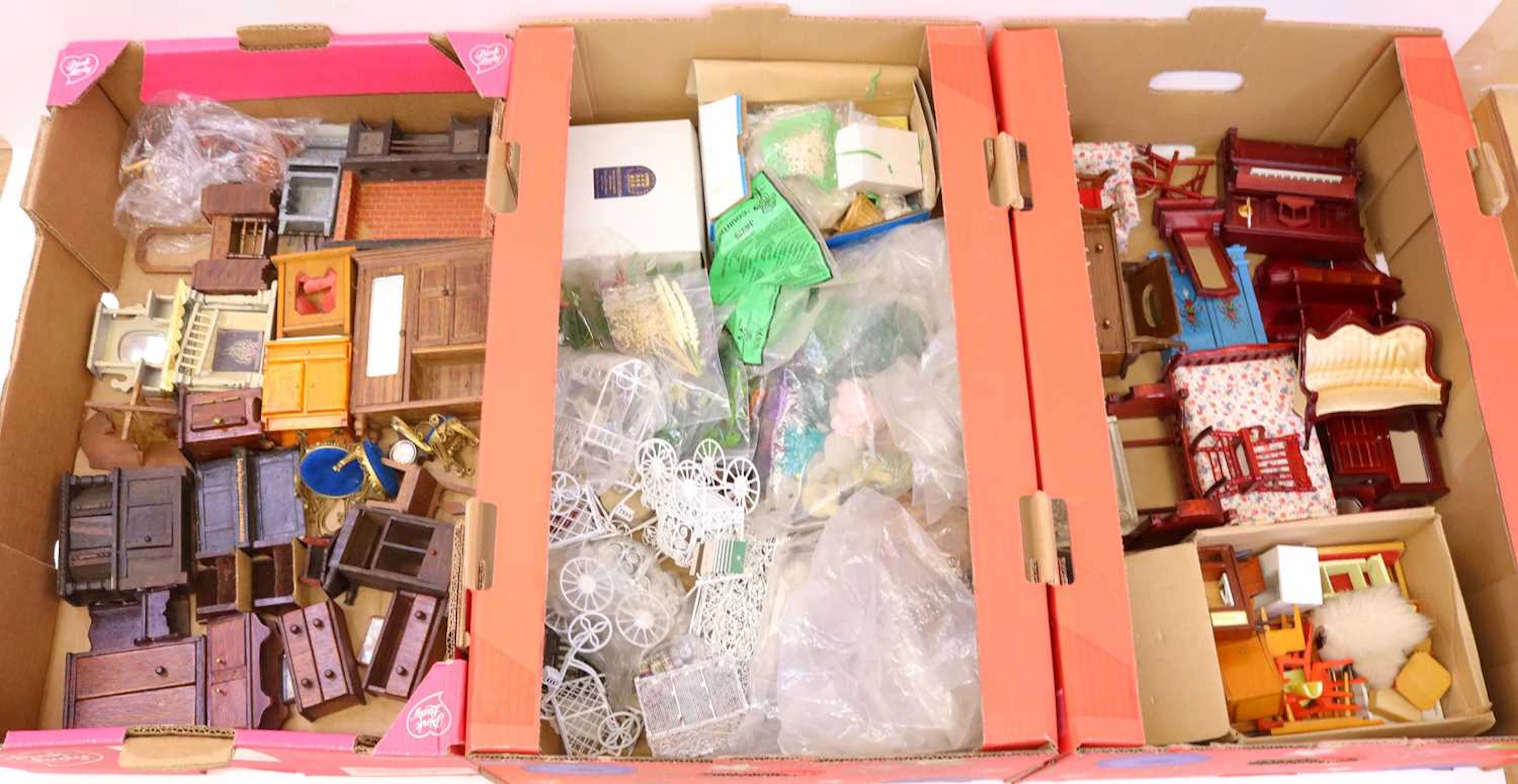 Lot 702 - Three trays containing Dolls House furniture