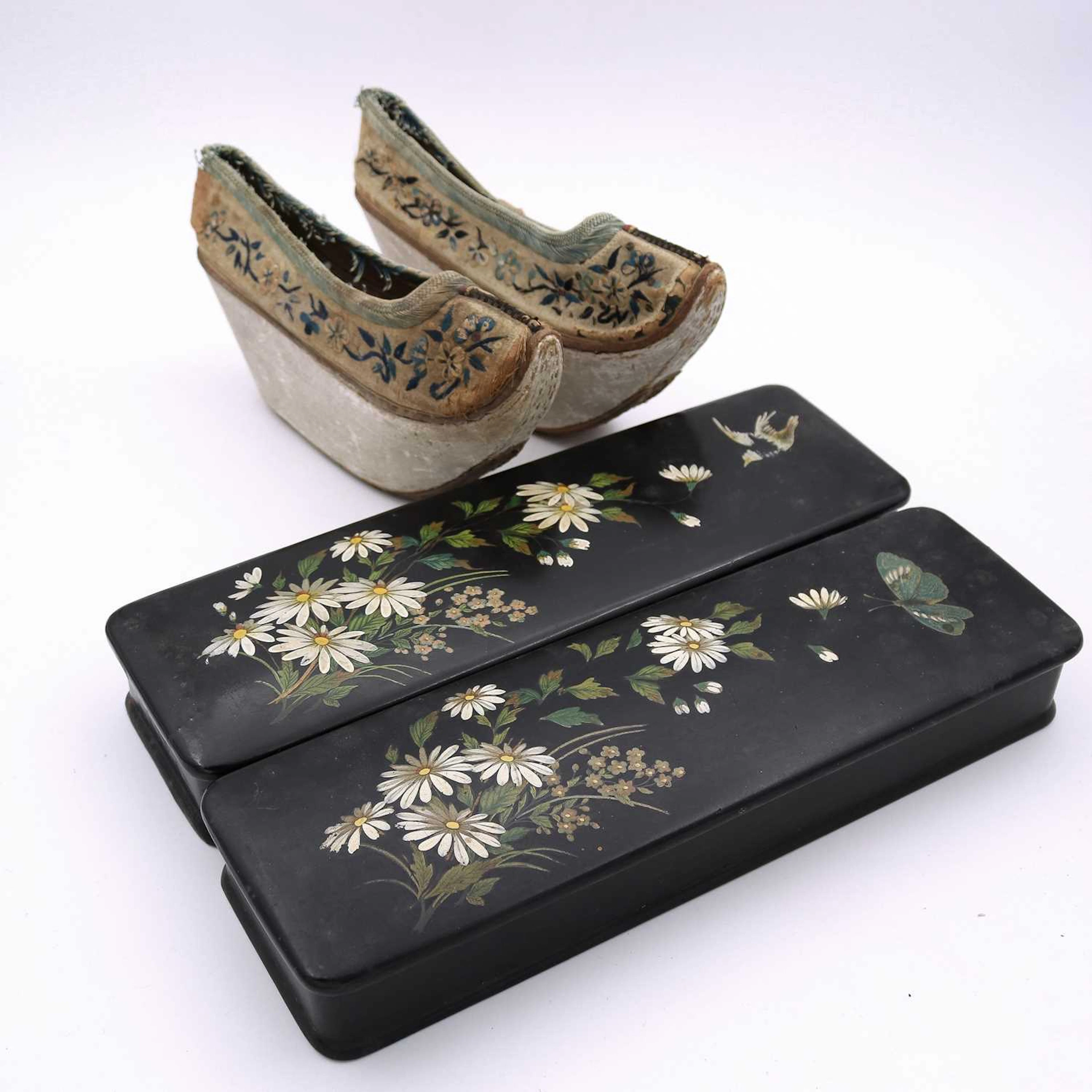 Lot 106 - A pair of Chinese embroidered silk platform