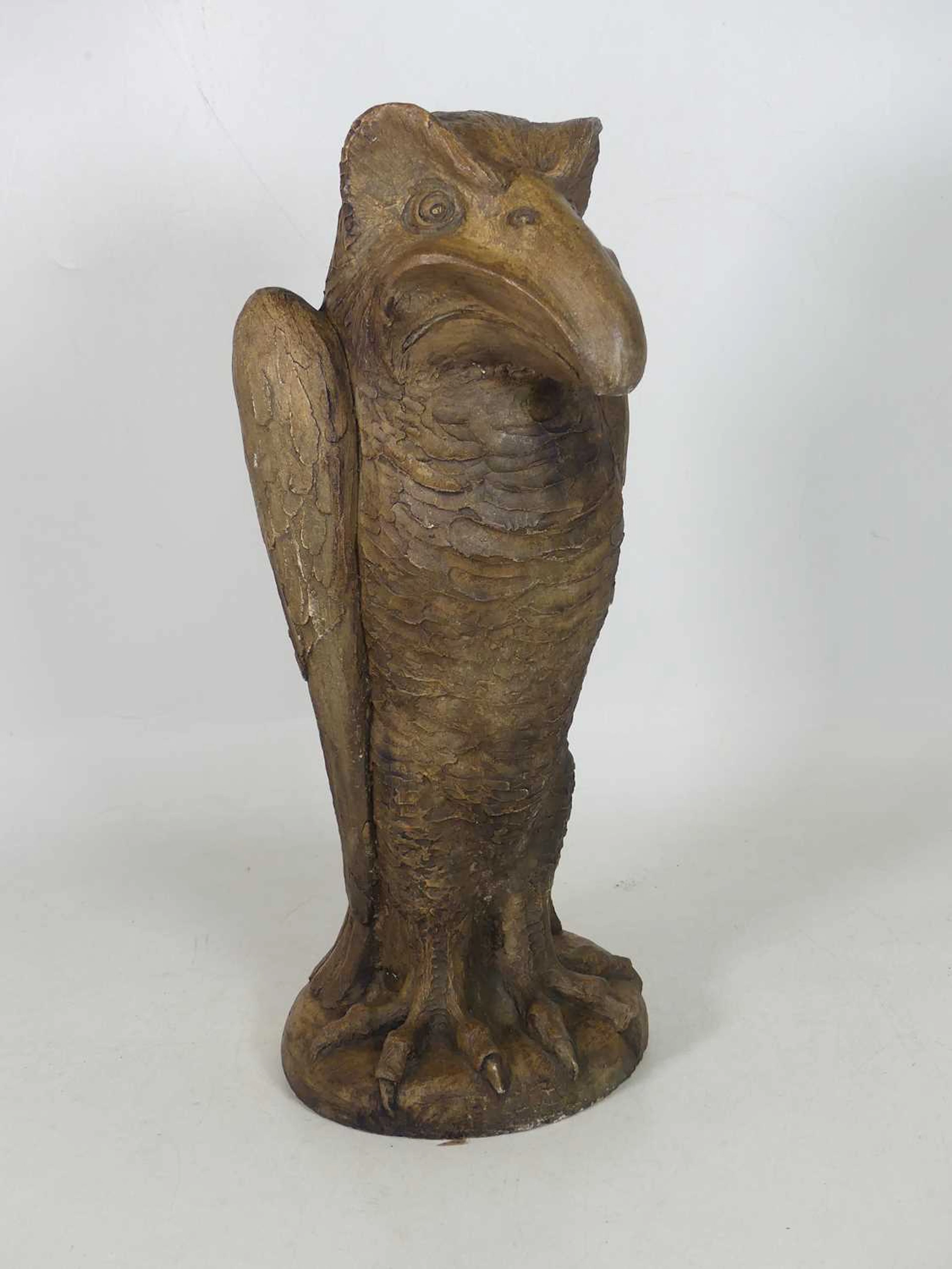 Lot 69 - A reproduction painted figure of a grotesque '