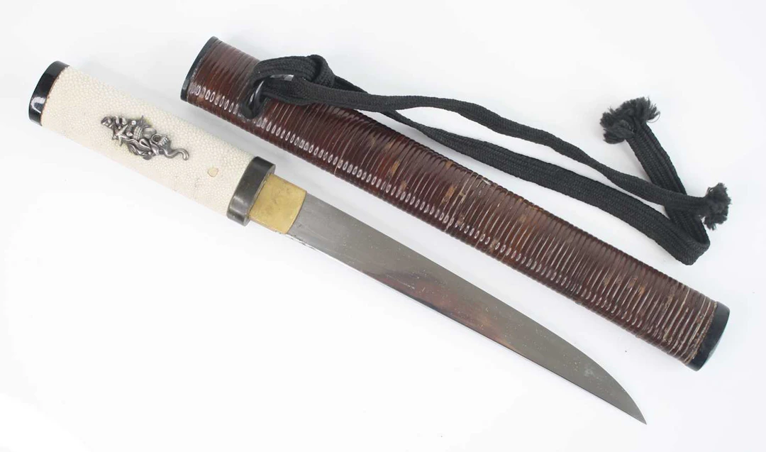 Lot 1244 - A Japanese Gendaito Tanto, having a 24cm