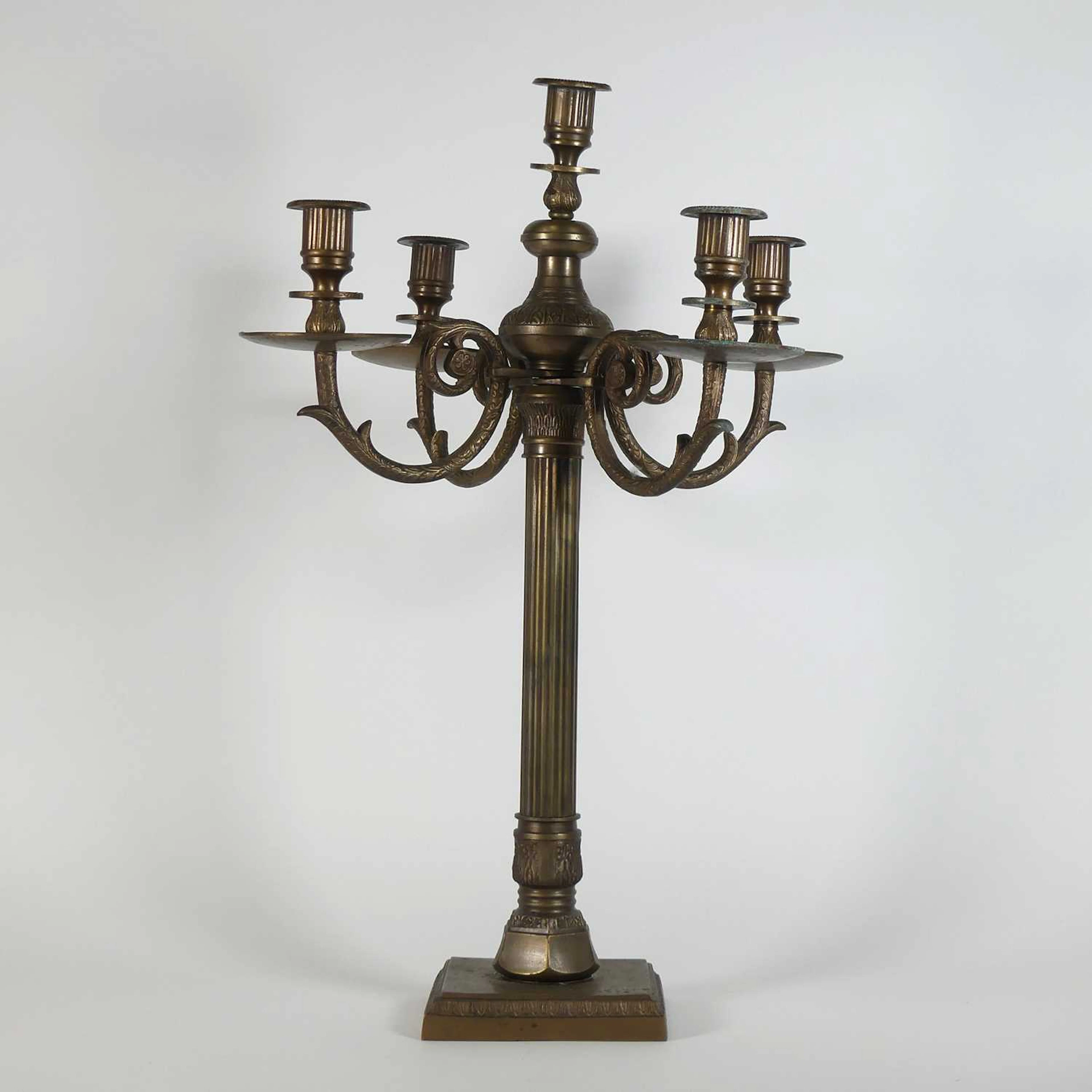 Lot 105 - A contemporary cast metal five-branch table
