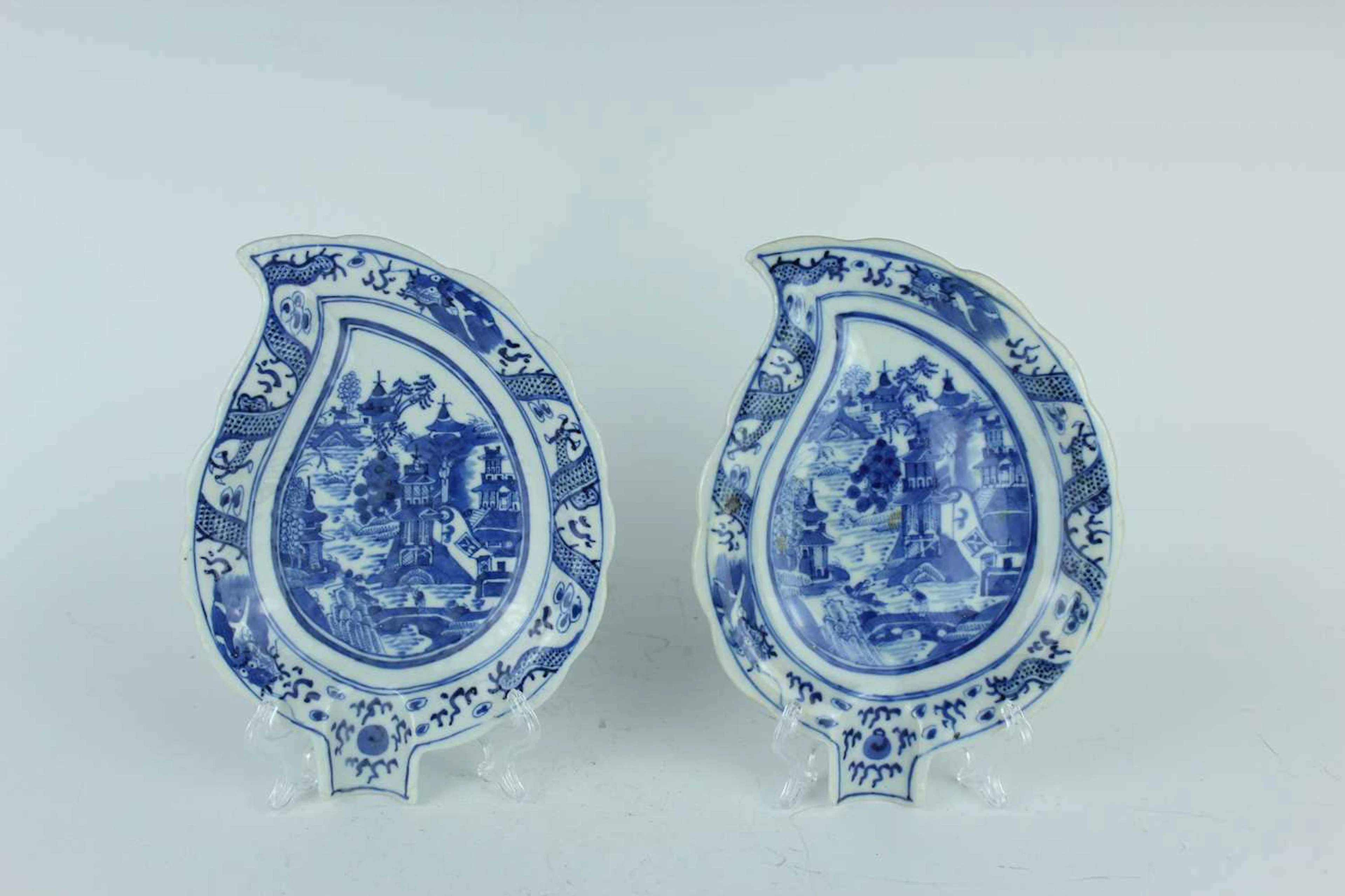 Lot 11 - A pair of Chinese blue and white leaf-shaped