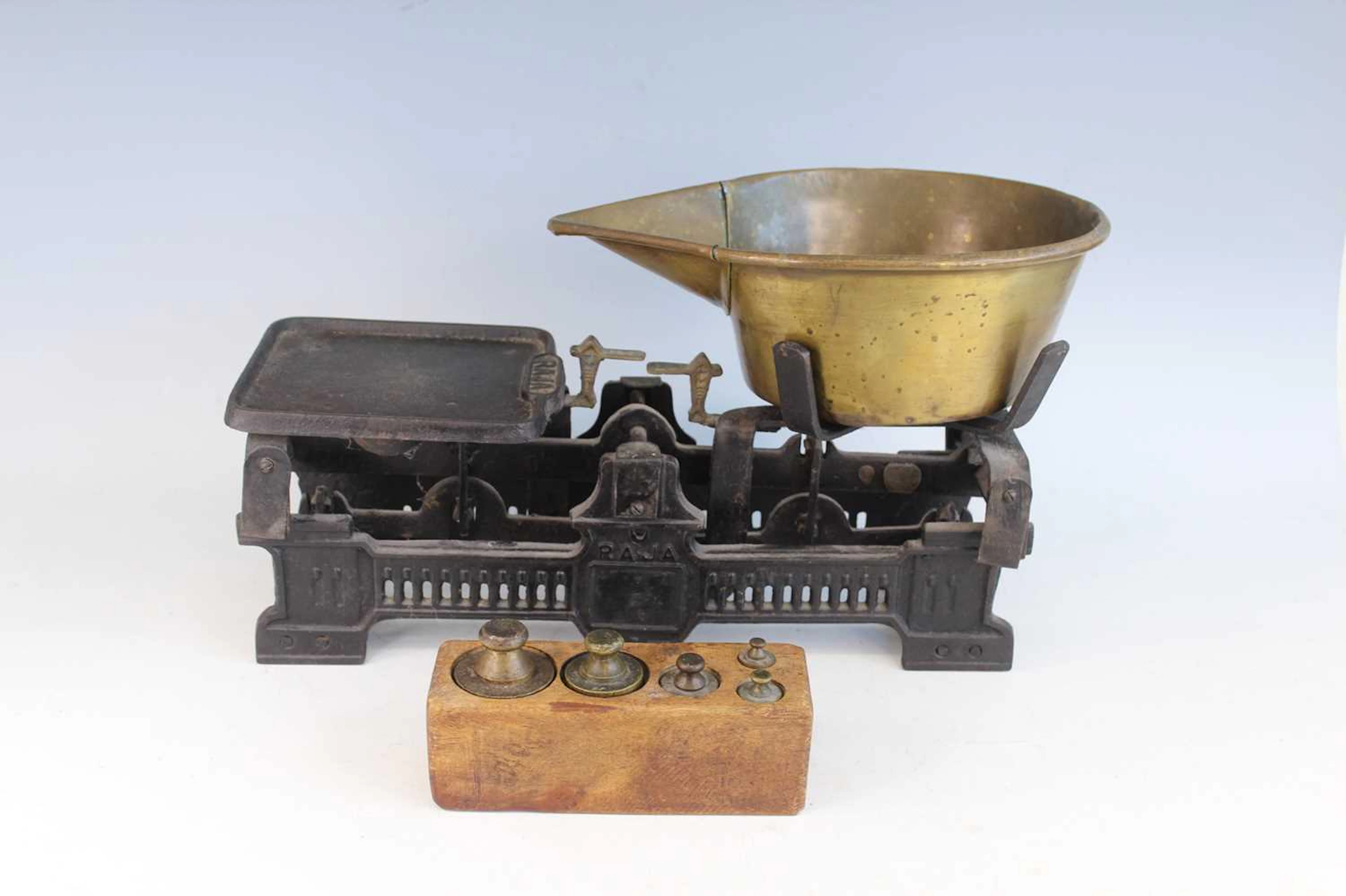 Lot 219 - A large cast-iron and brass balance scale