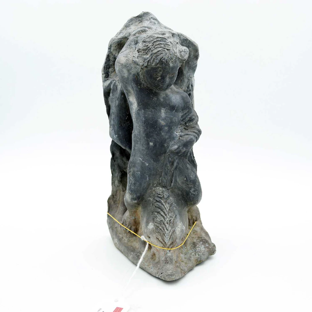 Lot 33 - A cast lead architectural element in the form