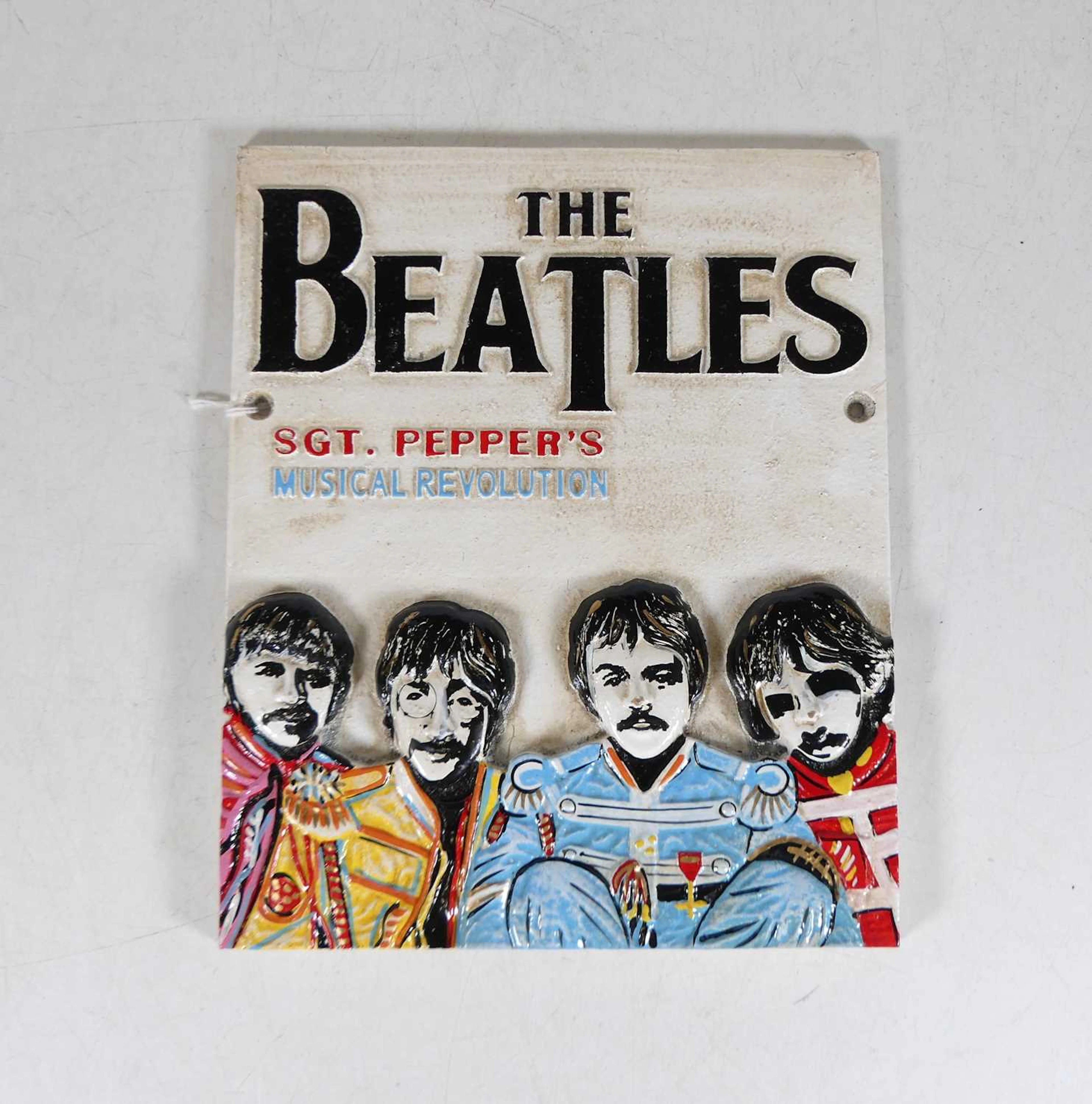 Lot 40 - A reproduction painted cast metal Beatles