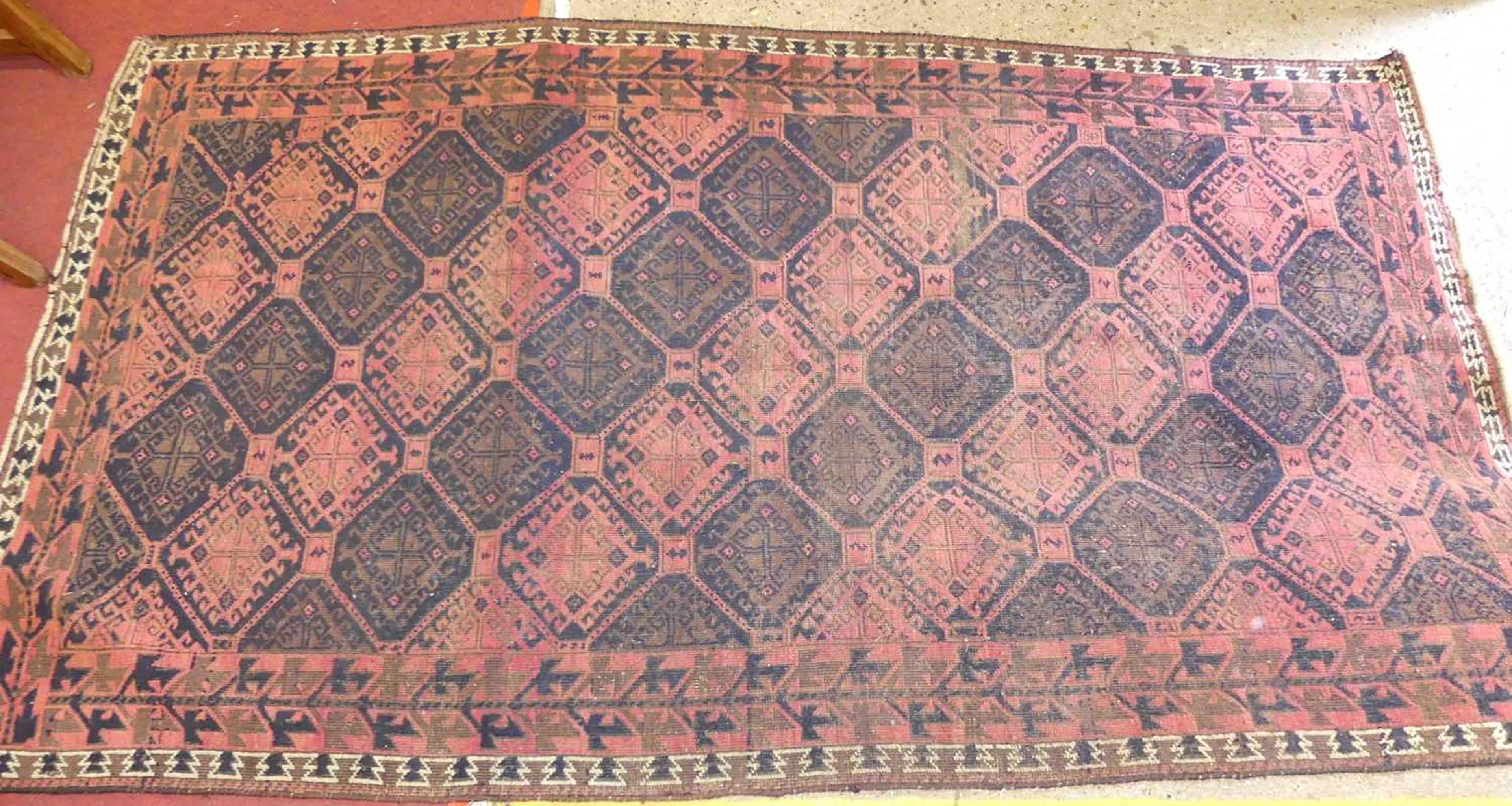Lot 742 - A Turkish woollen red and black ground