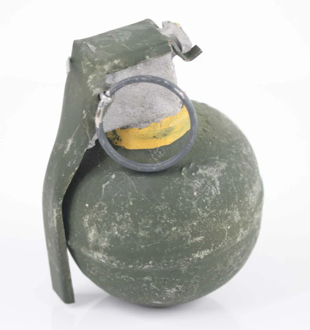 Lot 1239 - An inert M67 type grenade together with