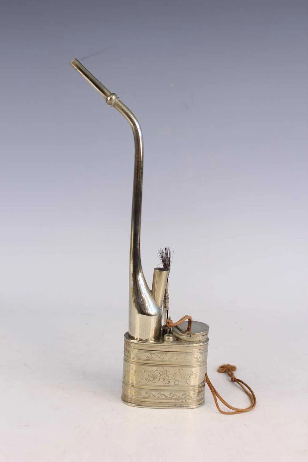 Lot 39 - A Chinese engraved white metal water pipe