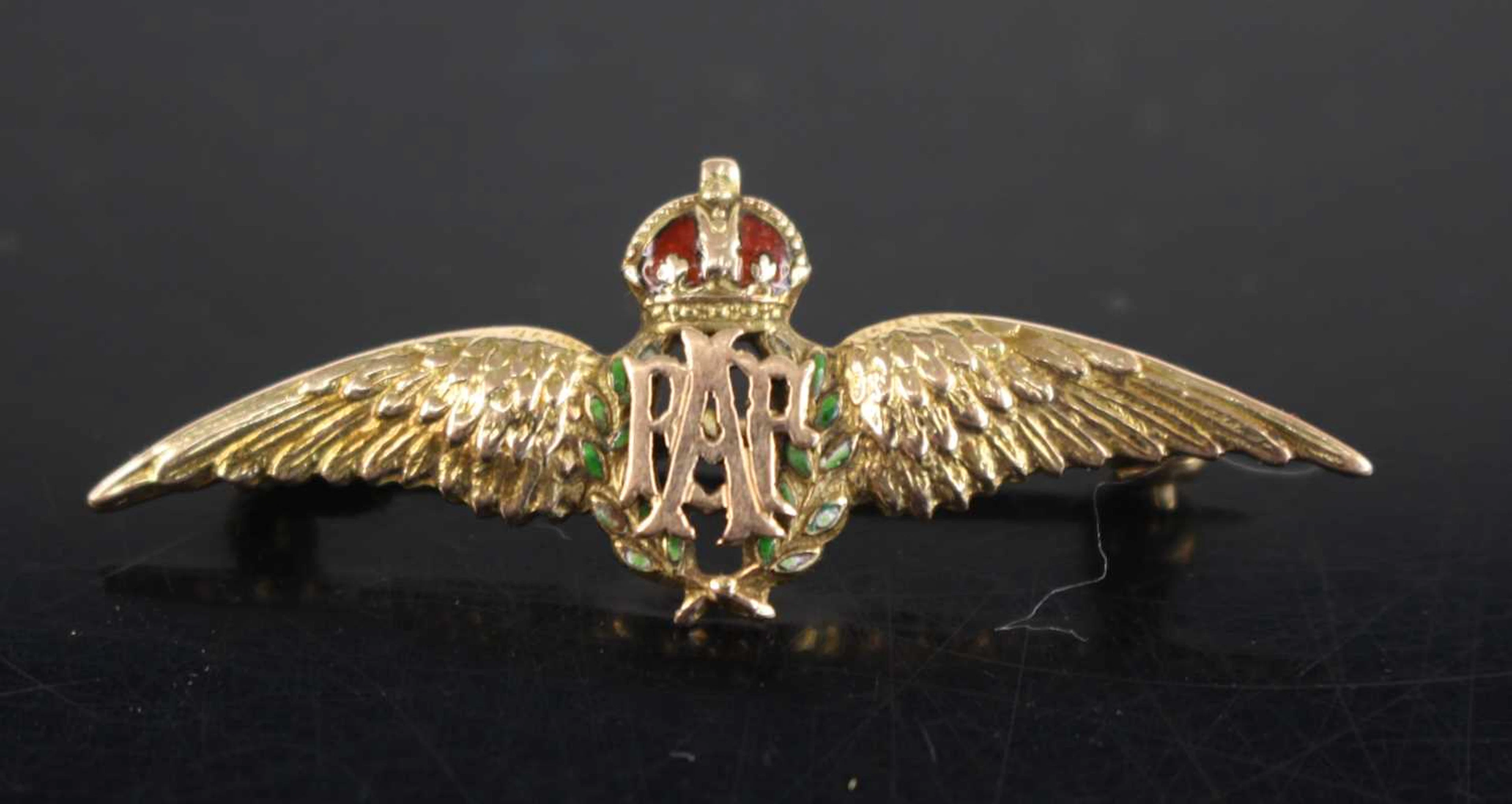 Lot 1069 - A WW II yellow metal and enamelled RAF