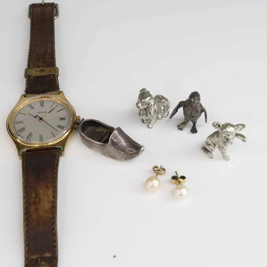 Lot 241 - Assorted silver and white metal charms, clog