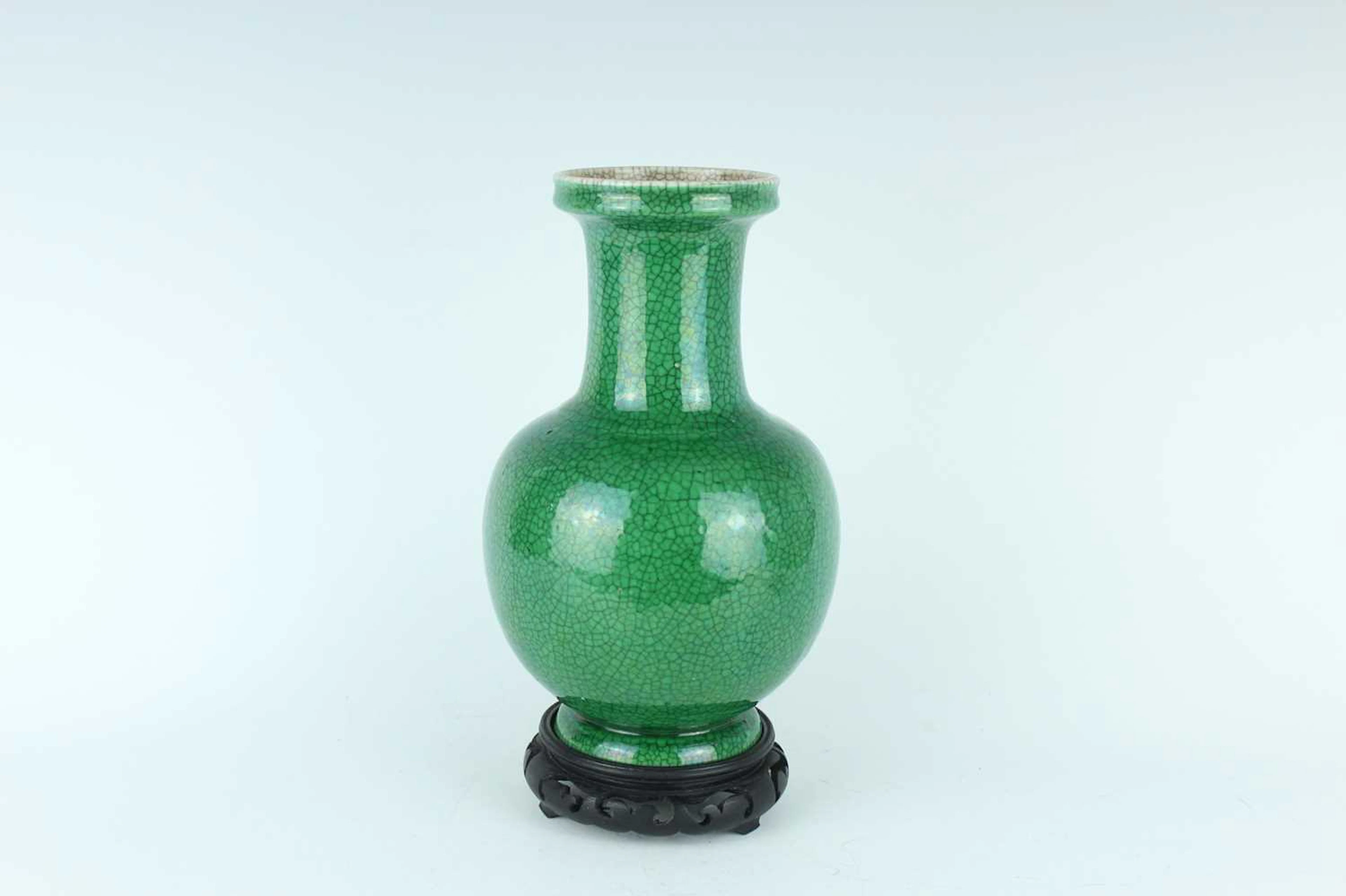 Lot 76 - A Chinese green crackle-glazed bottle vase