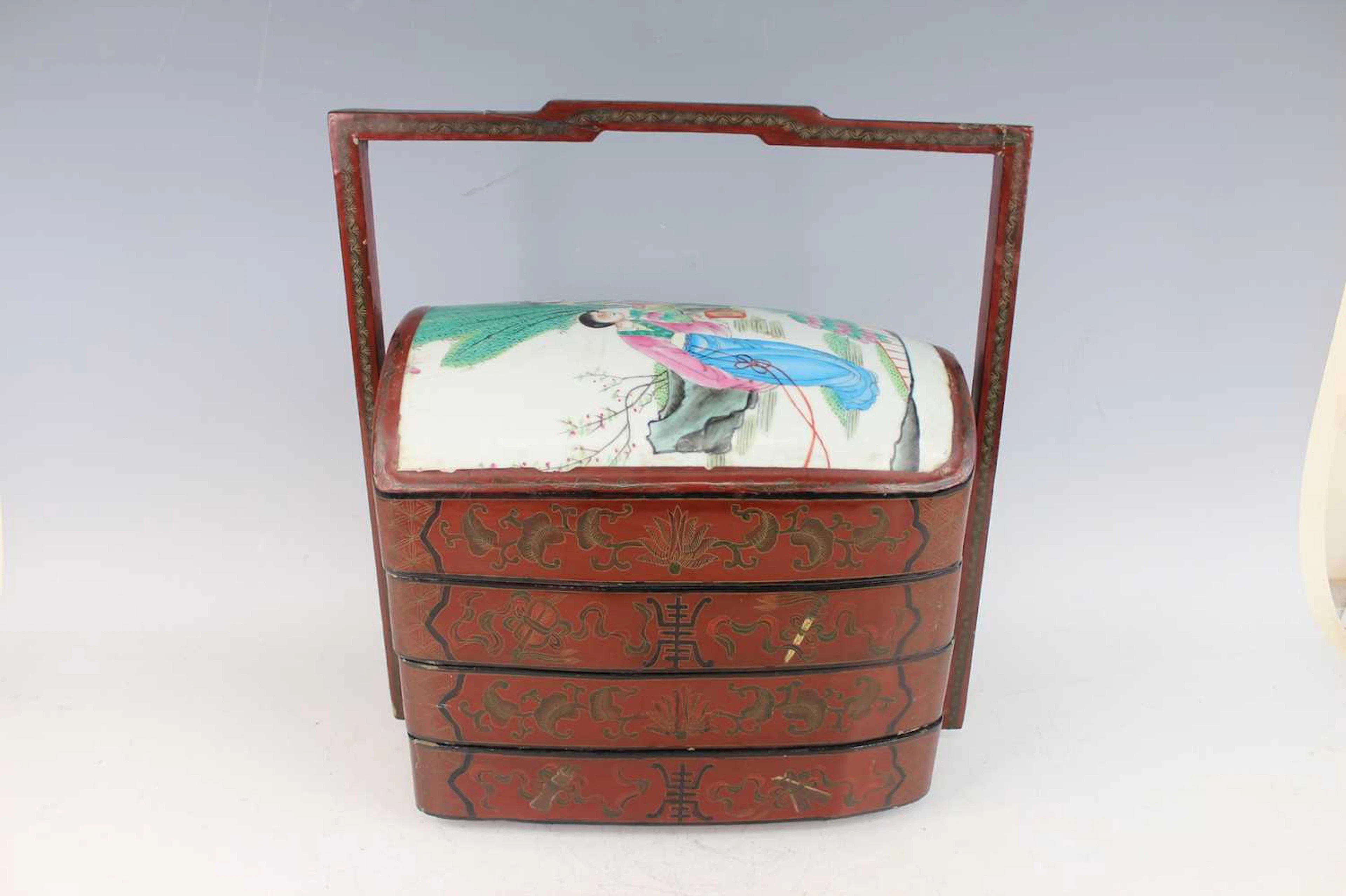 Lot 173 - A Chinese red lacquered four-tier food box