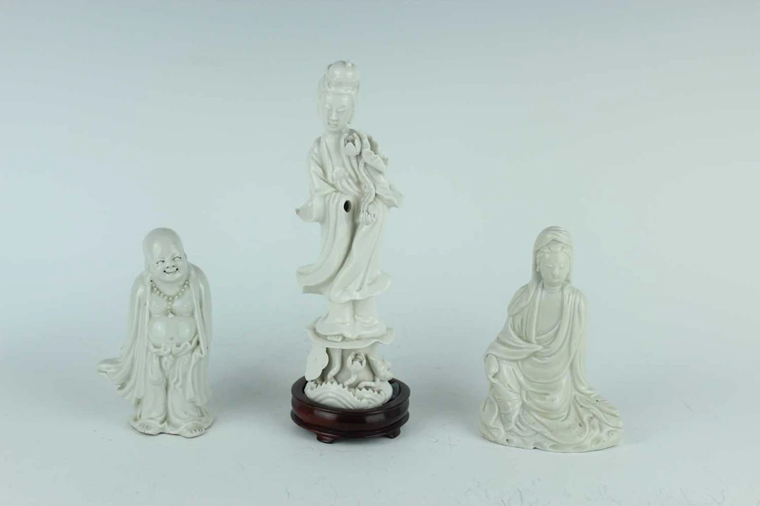Lot 50 - Three Chinese Dehua blanc-de-Chine figures