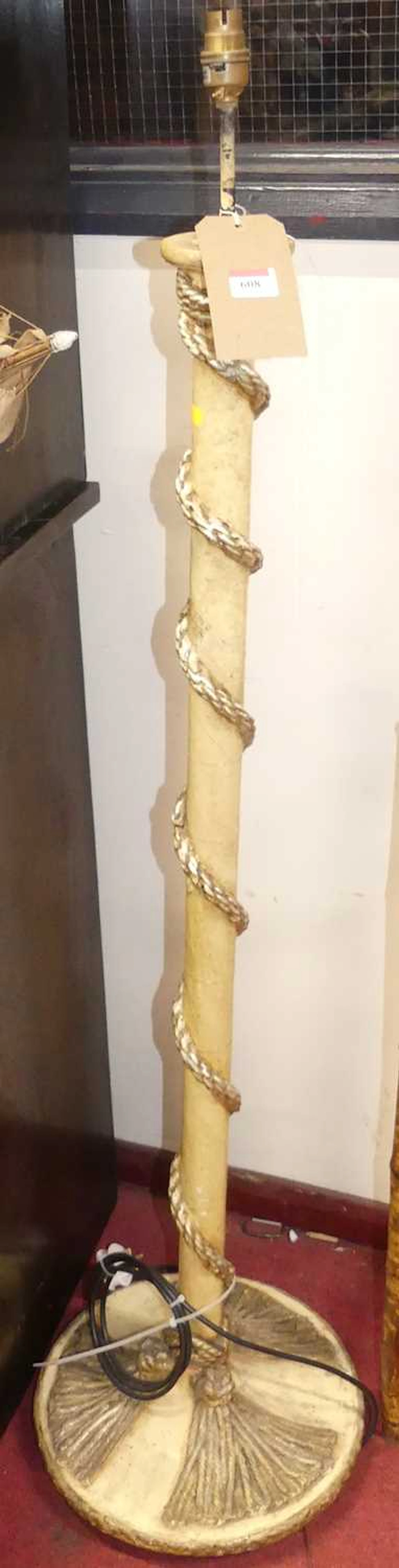 Lot 608 - An unusual cream painted terracotta standard